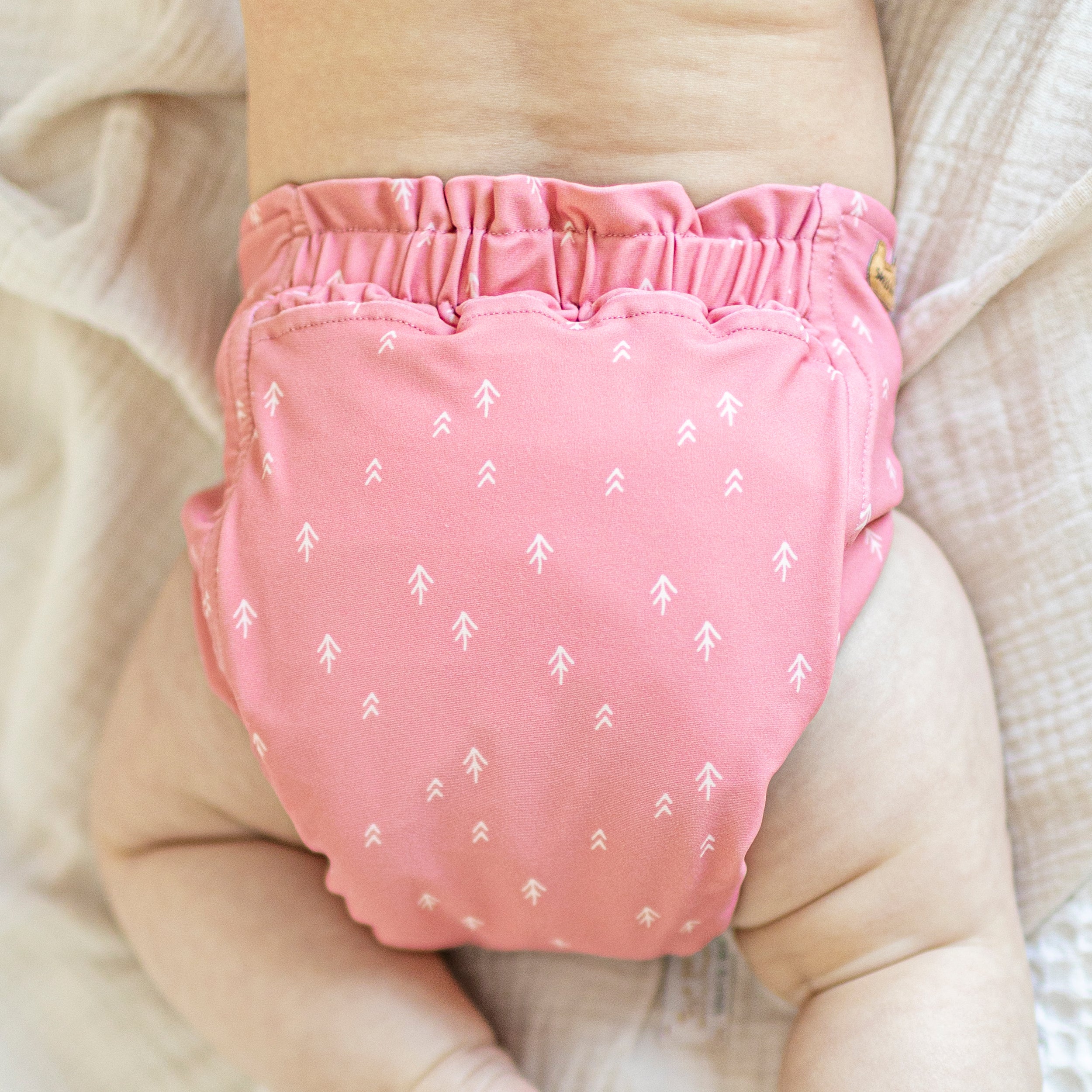 Ultra-thin pink reusable diaper with arrow pattern, baby