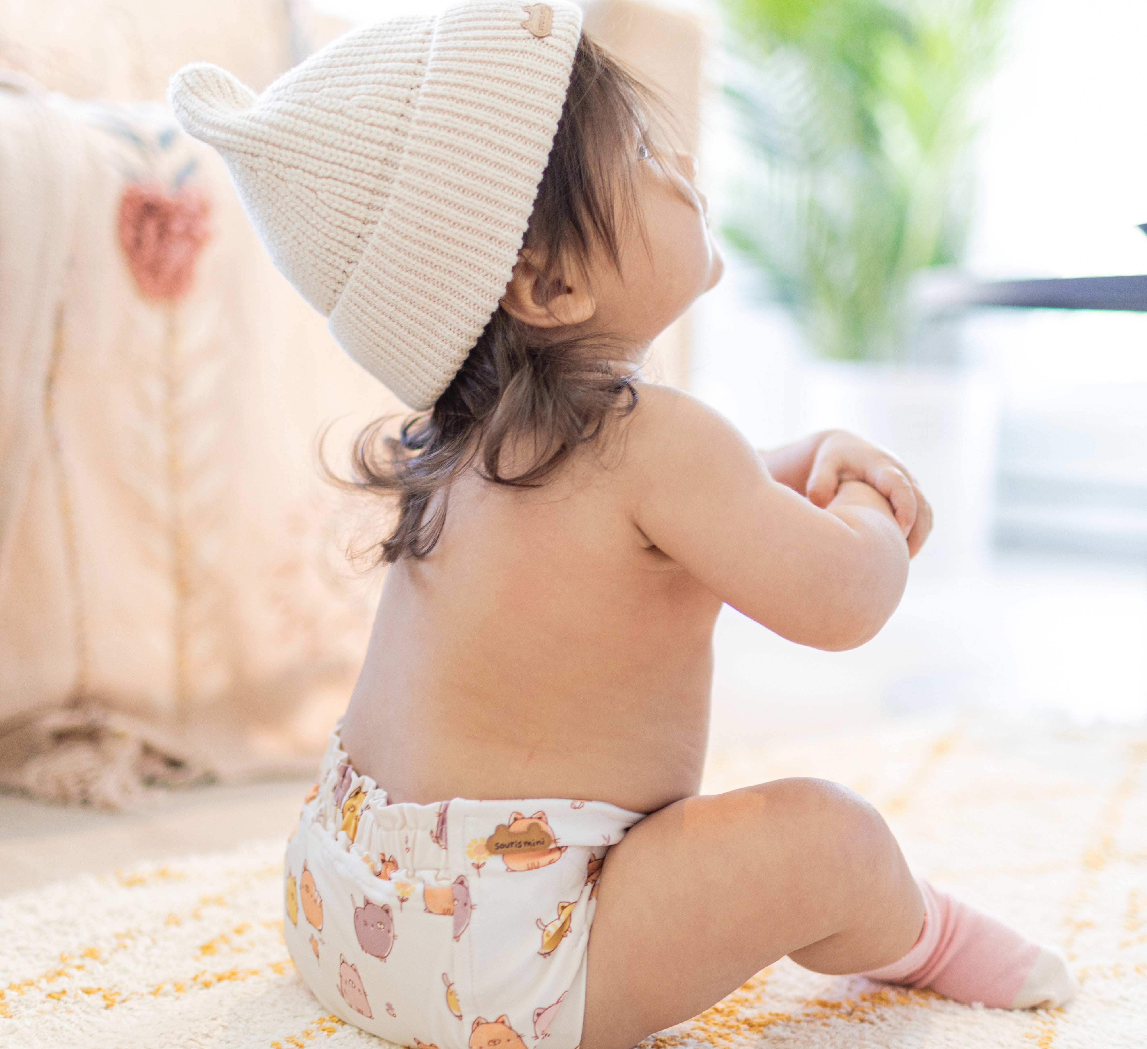 Ultra-thin cream reusable diaper with cat all over print, baby