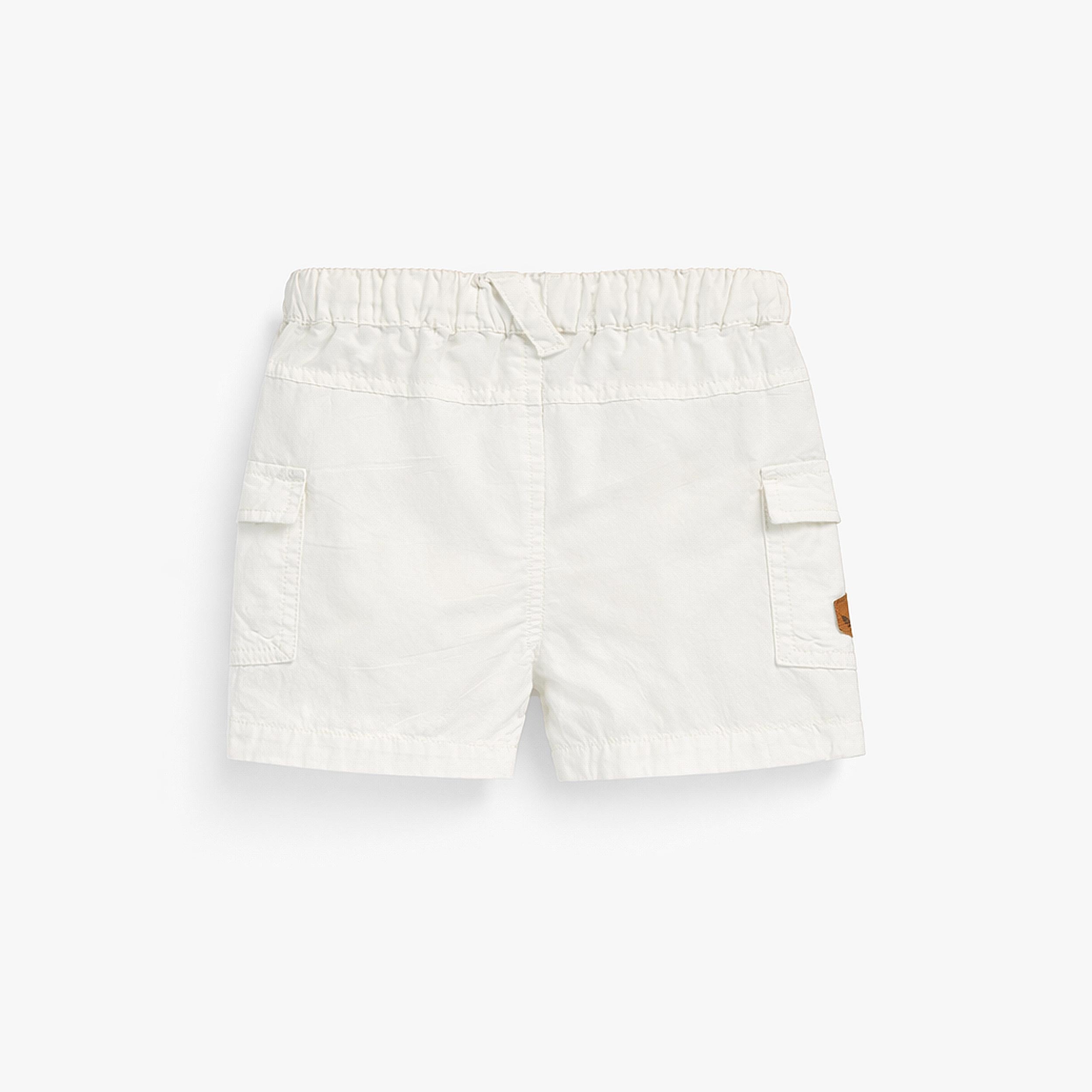 Dos du bermuda blanc en coton et lin, bébé