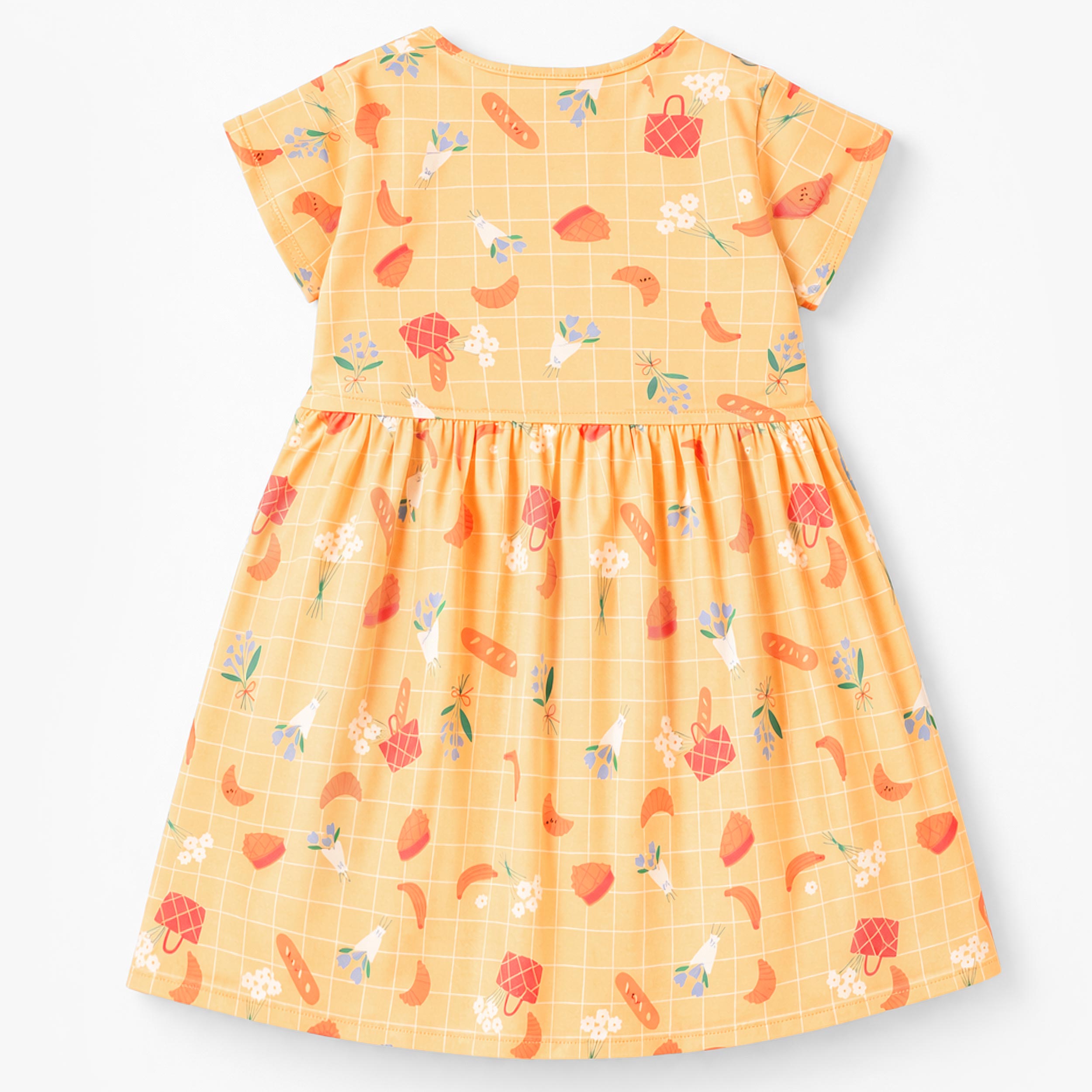 Dos de la robe jaune à motifs, enfant