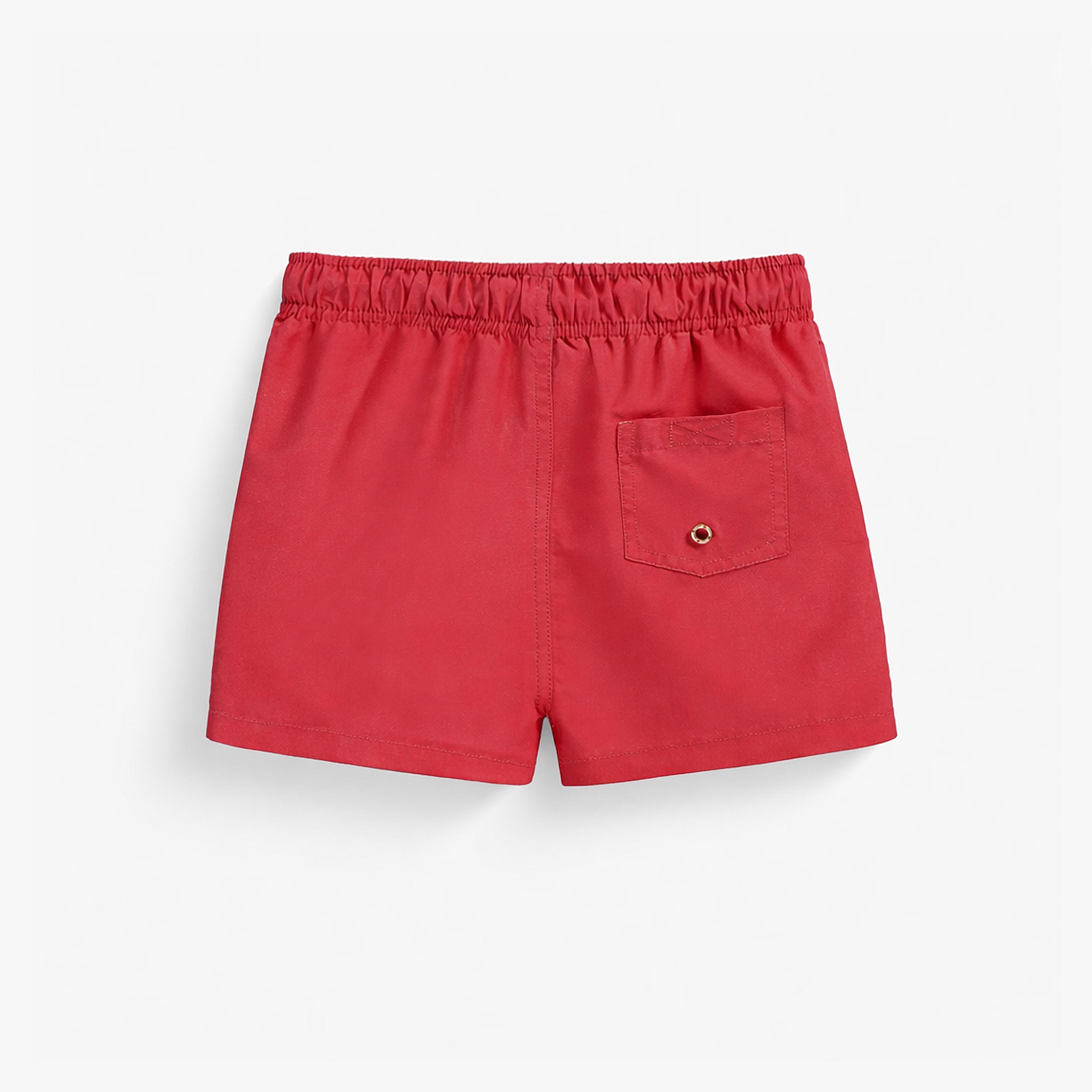 Dos du short de bain rouge, enfant