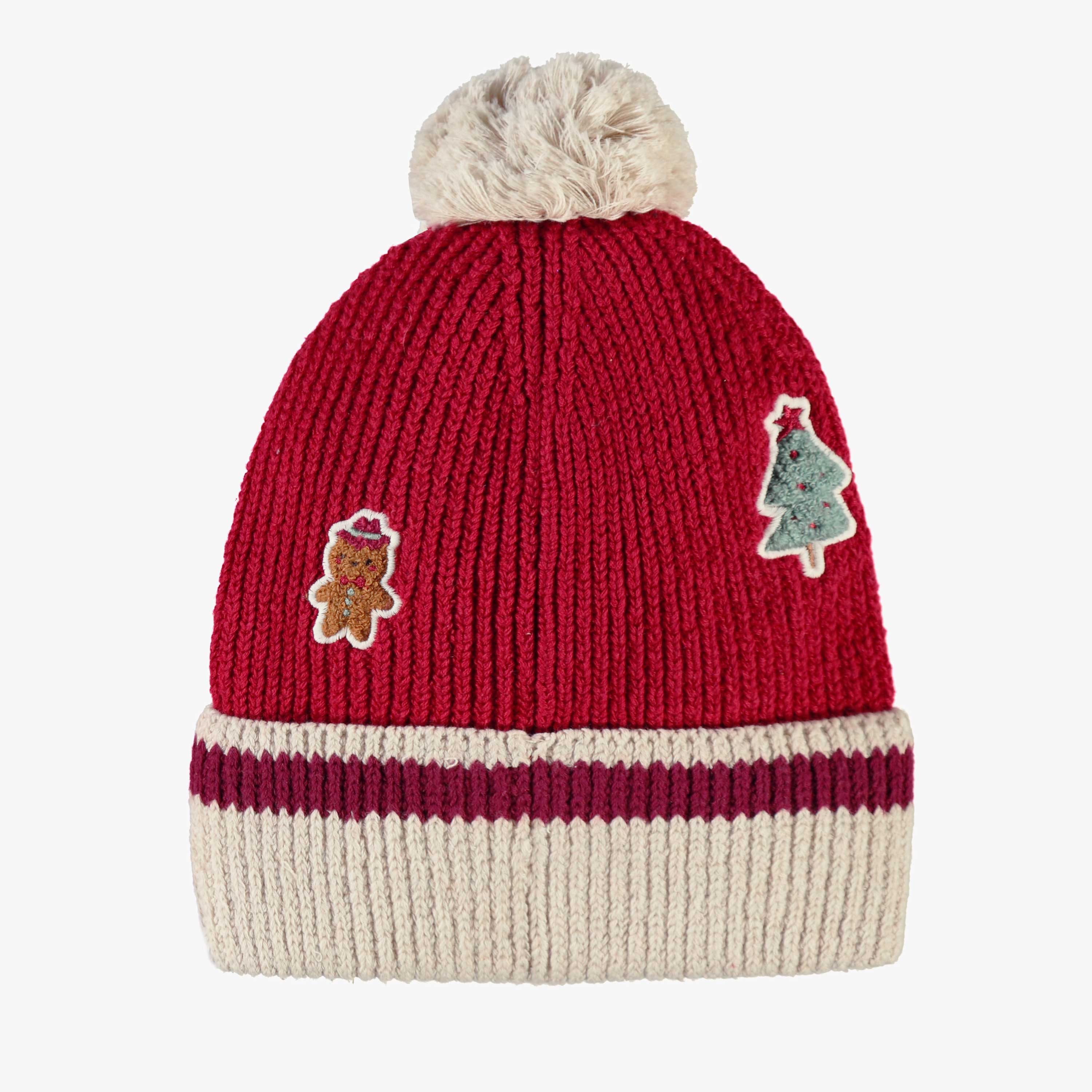 Dos de la tuque rouge en tricot avec motifs des Fêtes, adulte