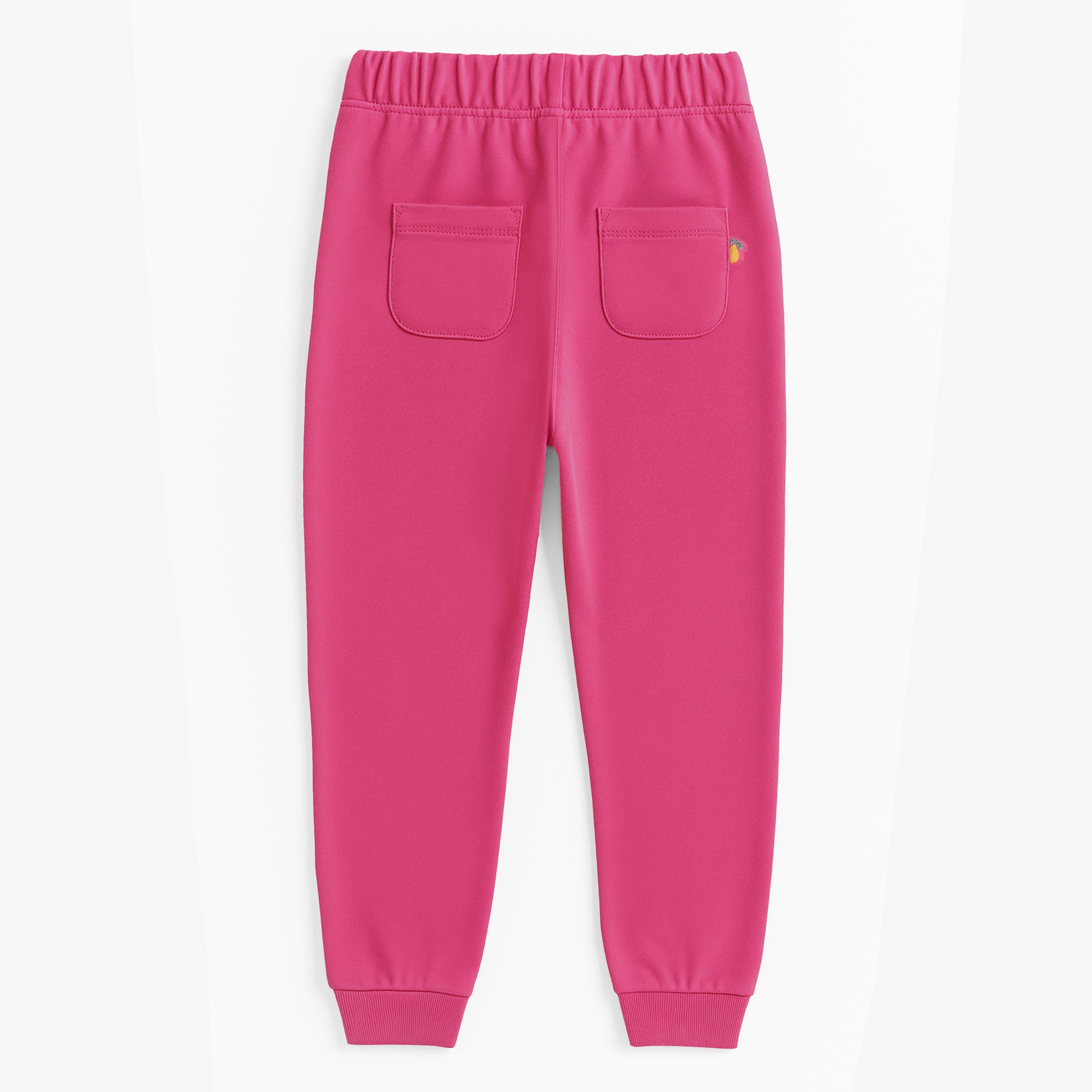 Dos du pantalon rose foncé de style jogger, enfant