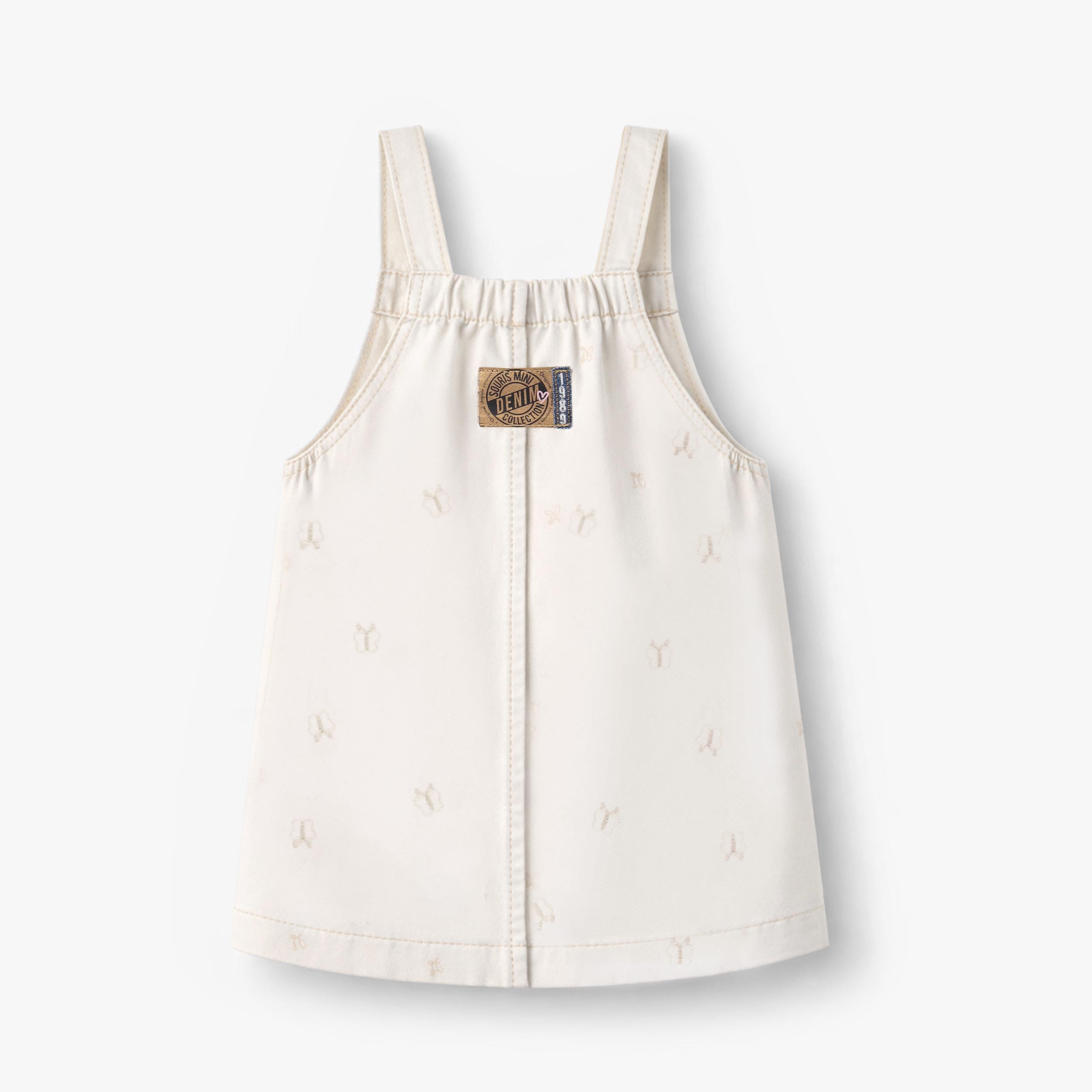 Dos de la robe crème en denim avec broderies de papillons, bébé