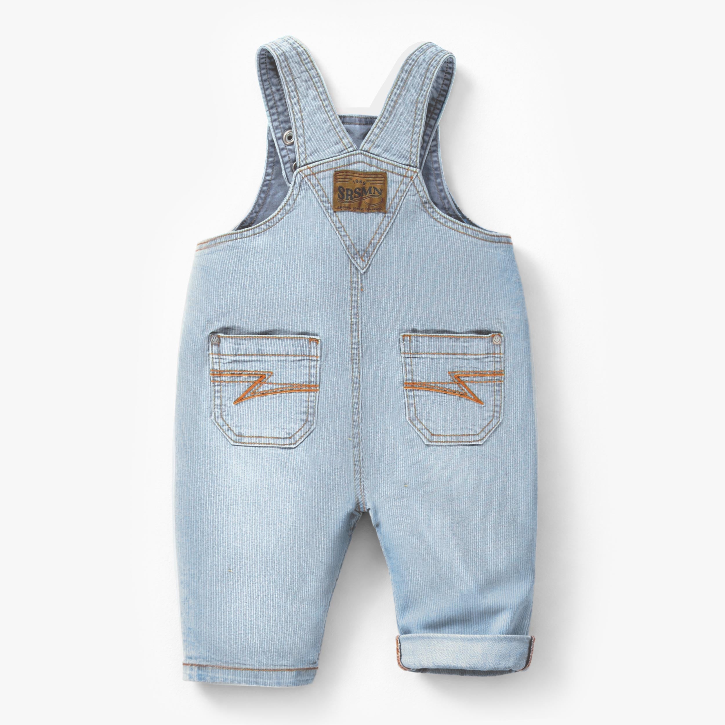 Dos de la salopette bleu pâle en denim à rayures, bébé