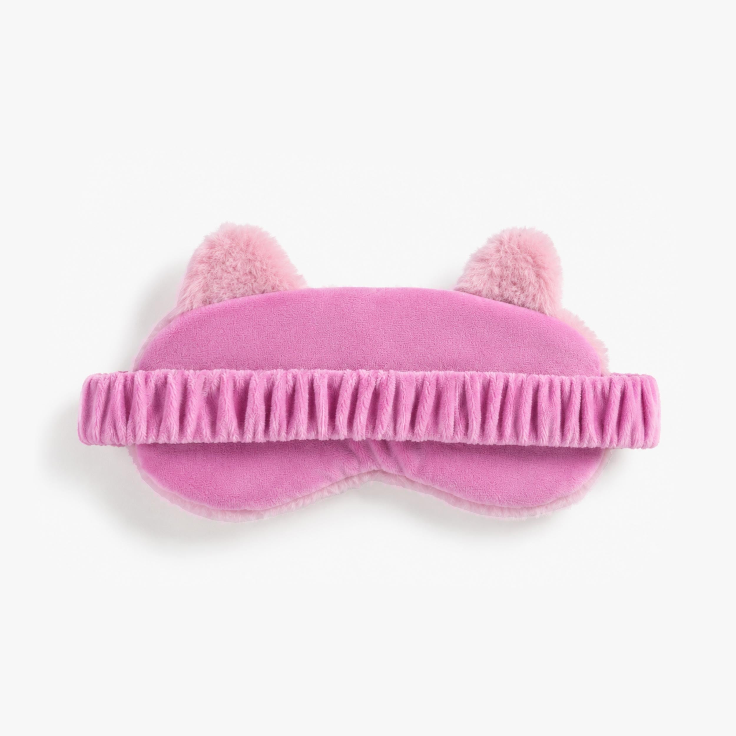 Vue arrière du masque de sommeil rose pour enfant avec bandeau élastique confortable et finition douce en peluche.