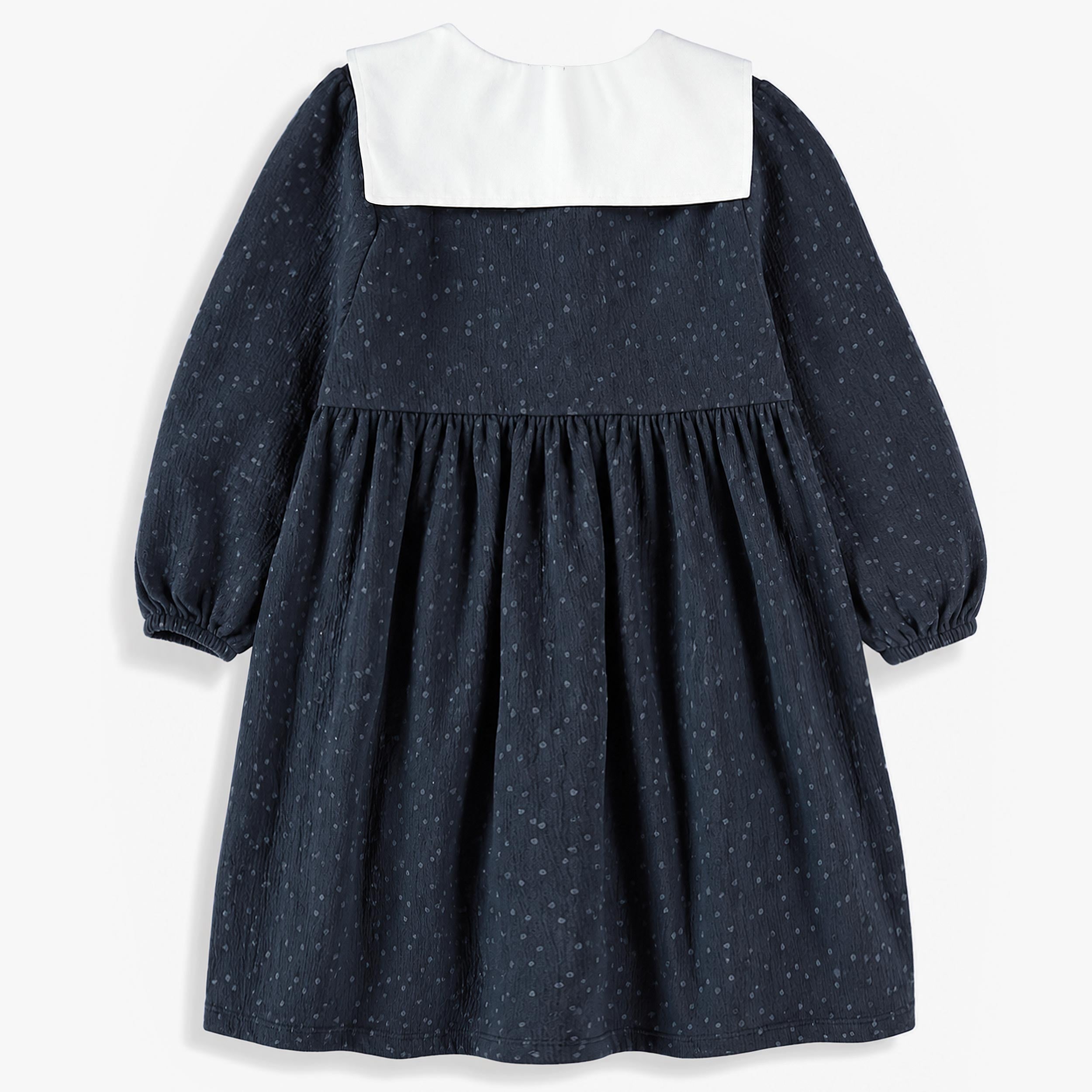 Dos de la robe bleu foncé en velours côtelé, enfant
