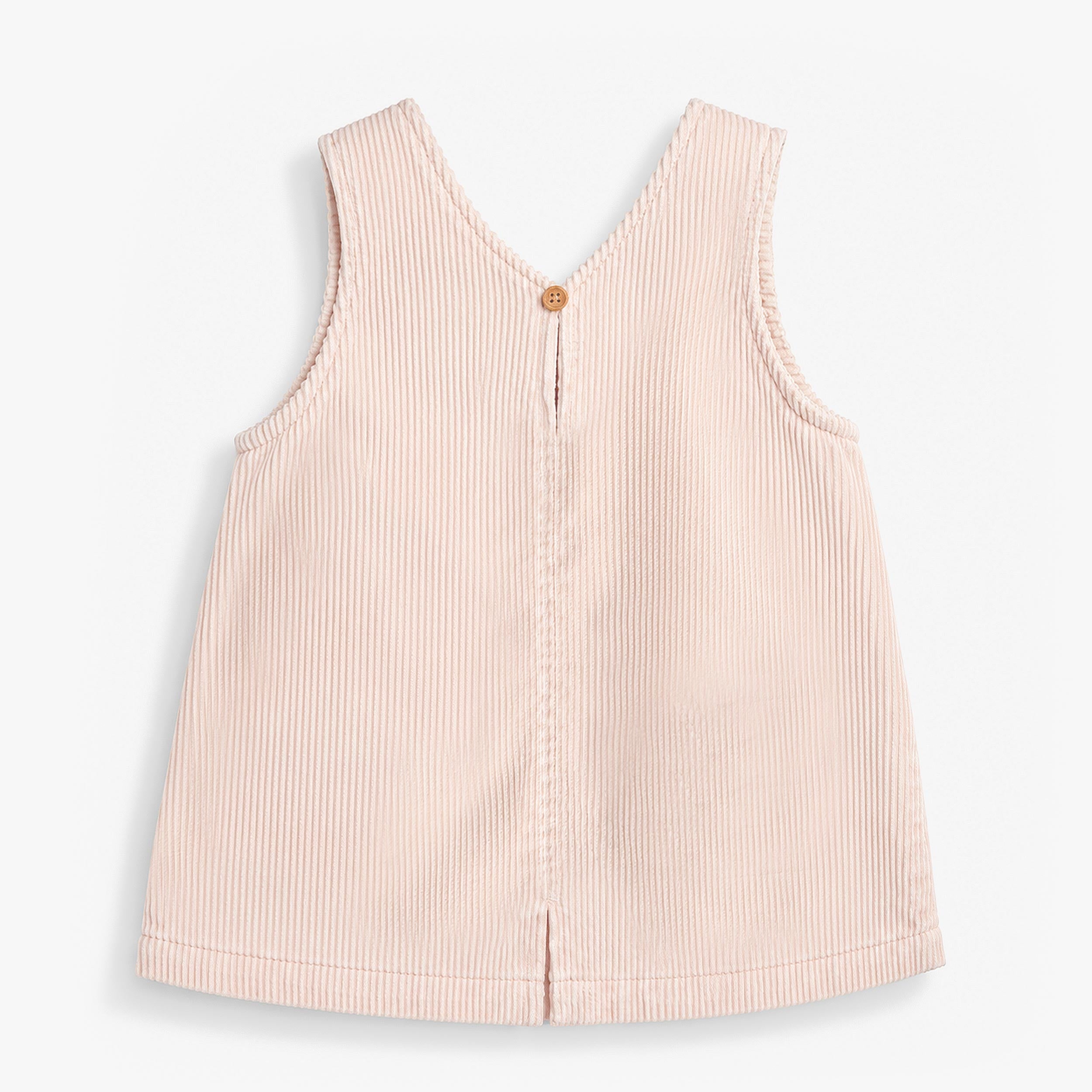 Dos de la robe jumper en velours côtelé rose à poches cœur, bébé