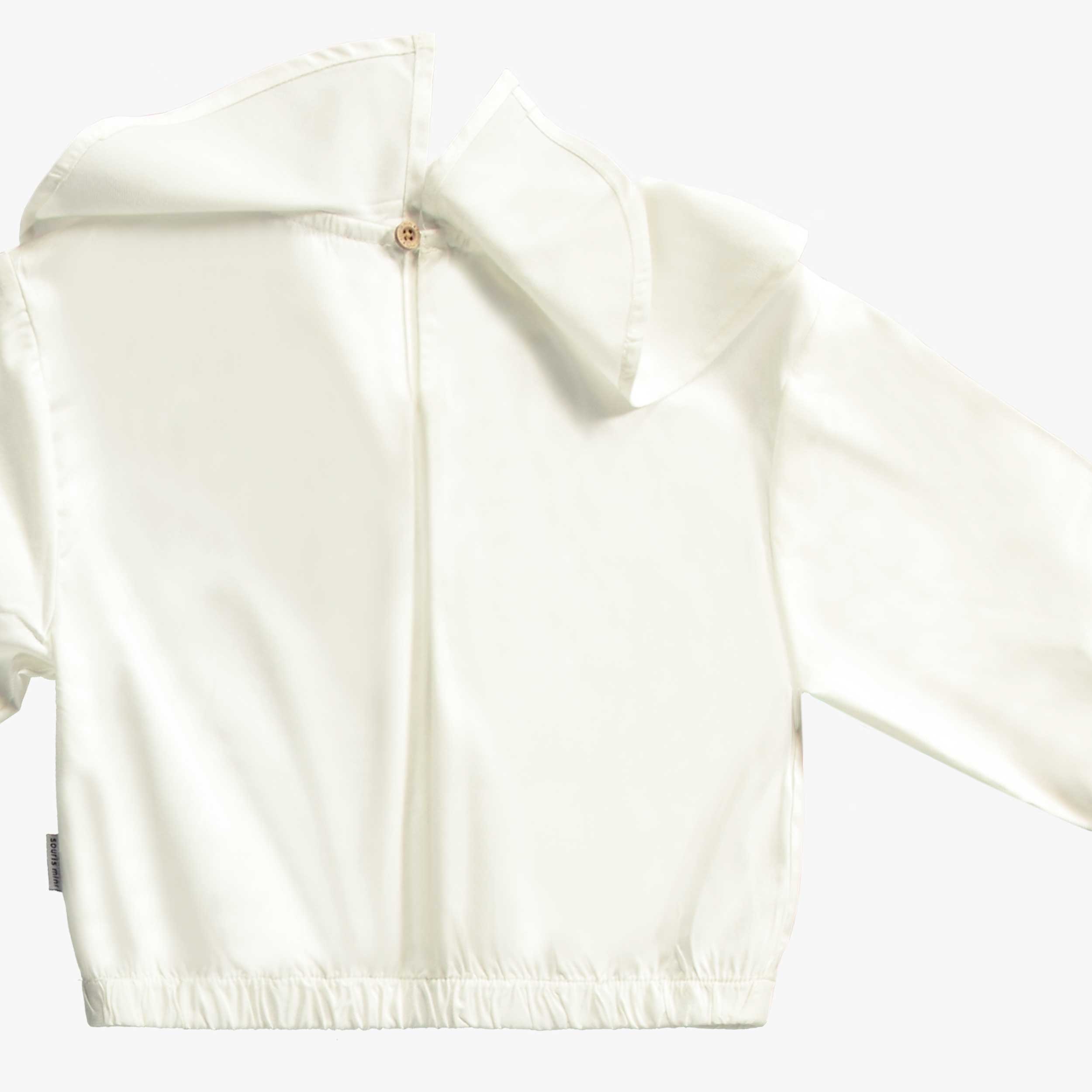 White blouse with jabot collar and long sleeves in modal satin effect, child