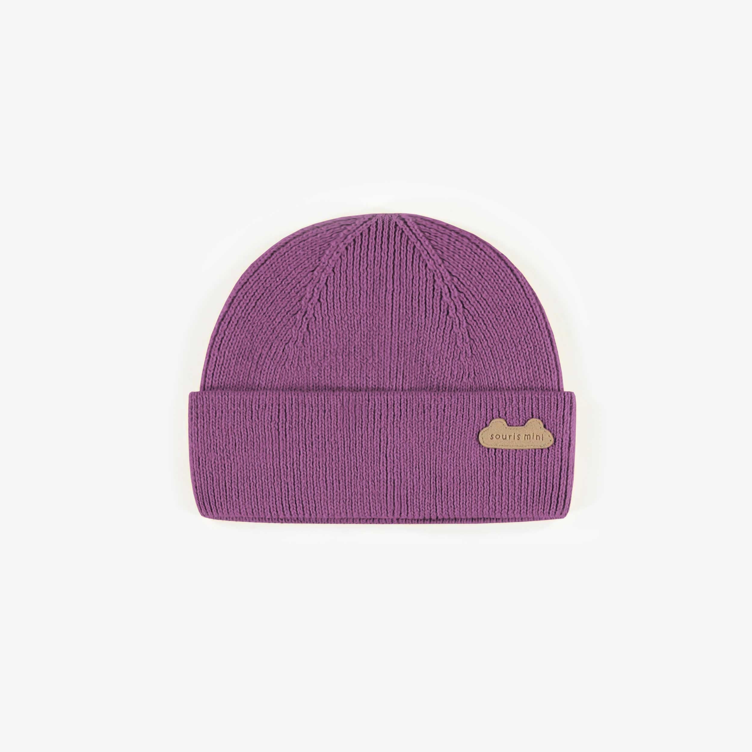 Tuque de maille mauve, naissance