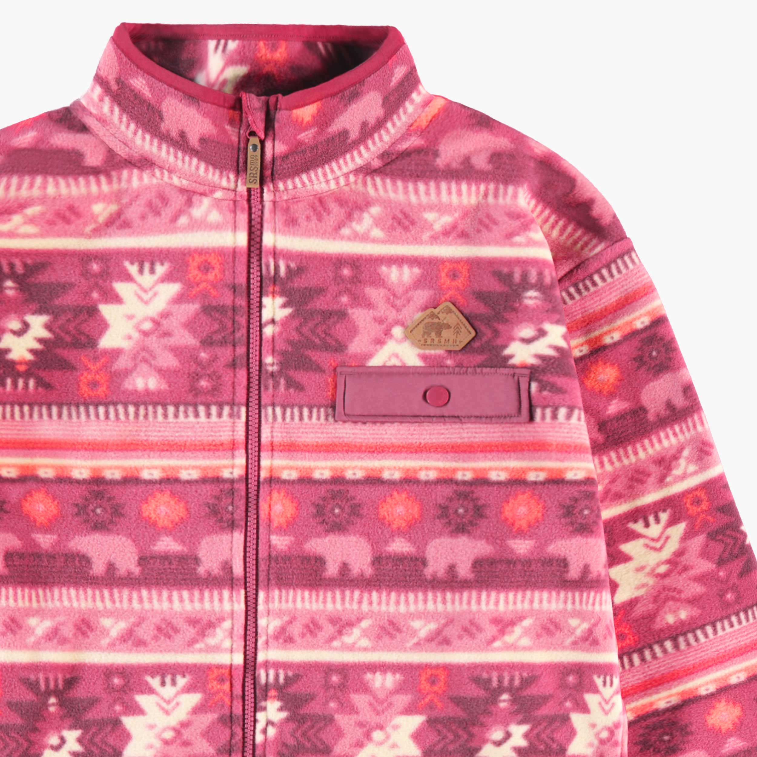 Zoom détails de la veste rose en polar avec motifs, adulte