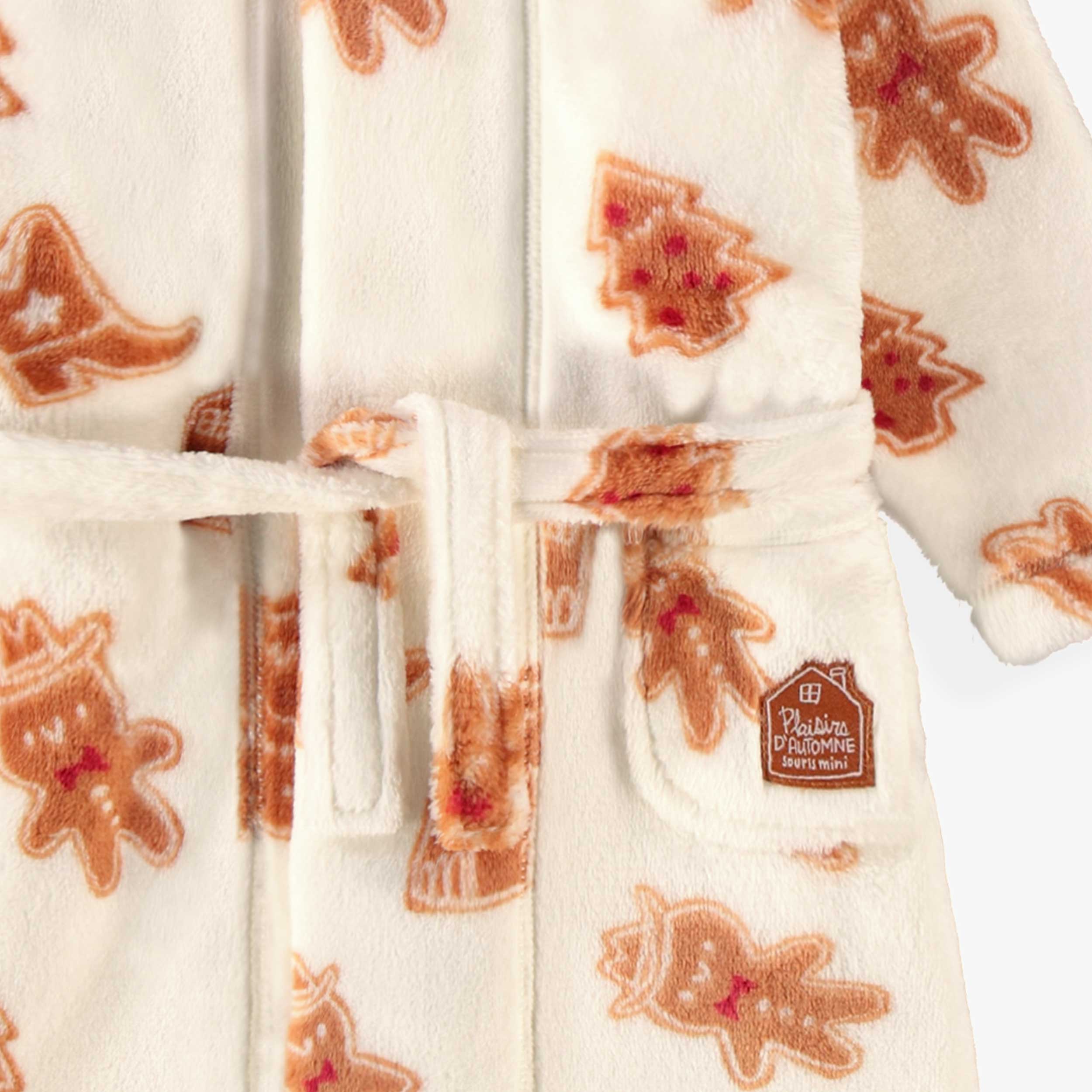Zoom détails de la robe de chambre crème à motifs pain d’épices, bébé
