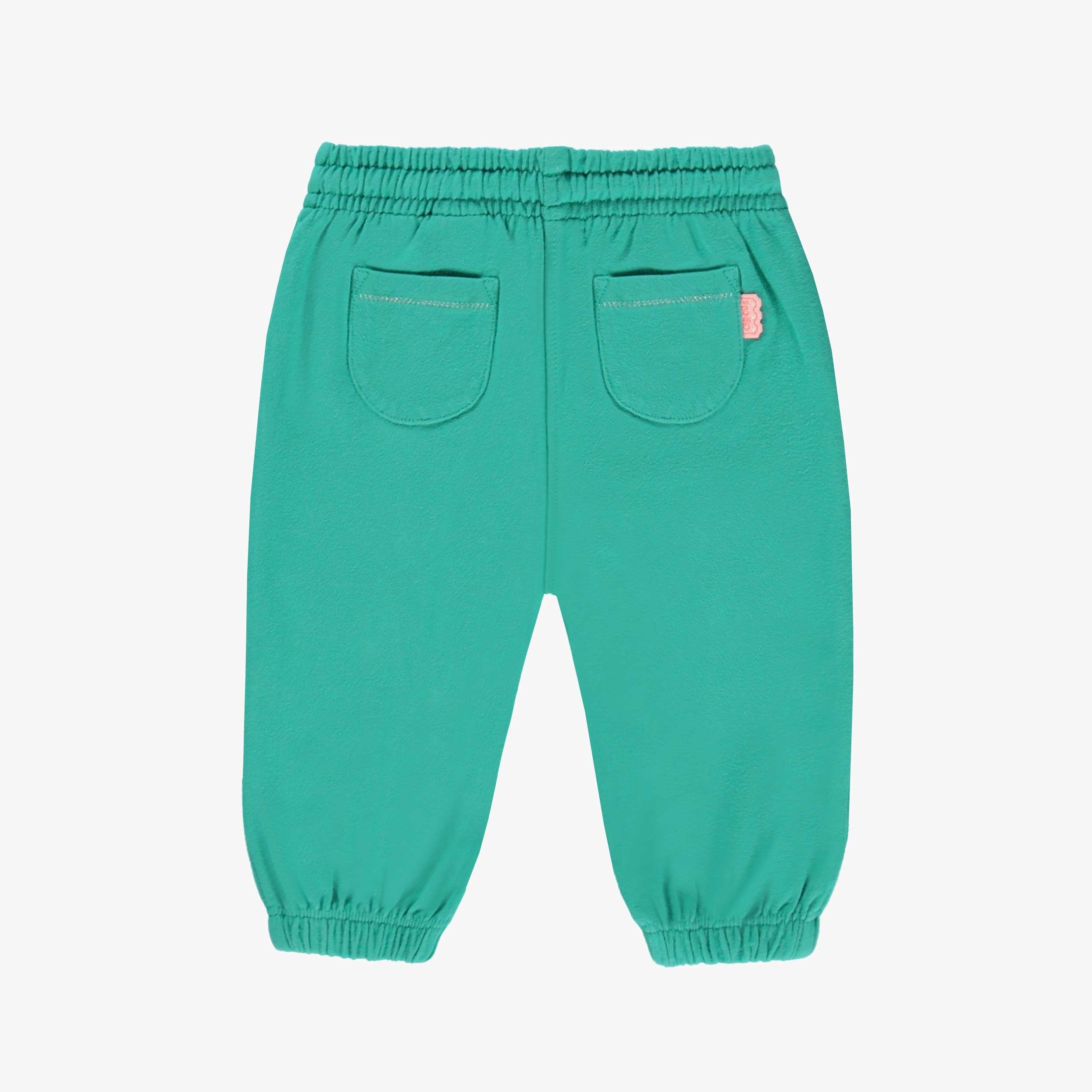 Dos du pantalon turquoise style jogger, bébé