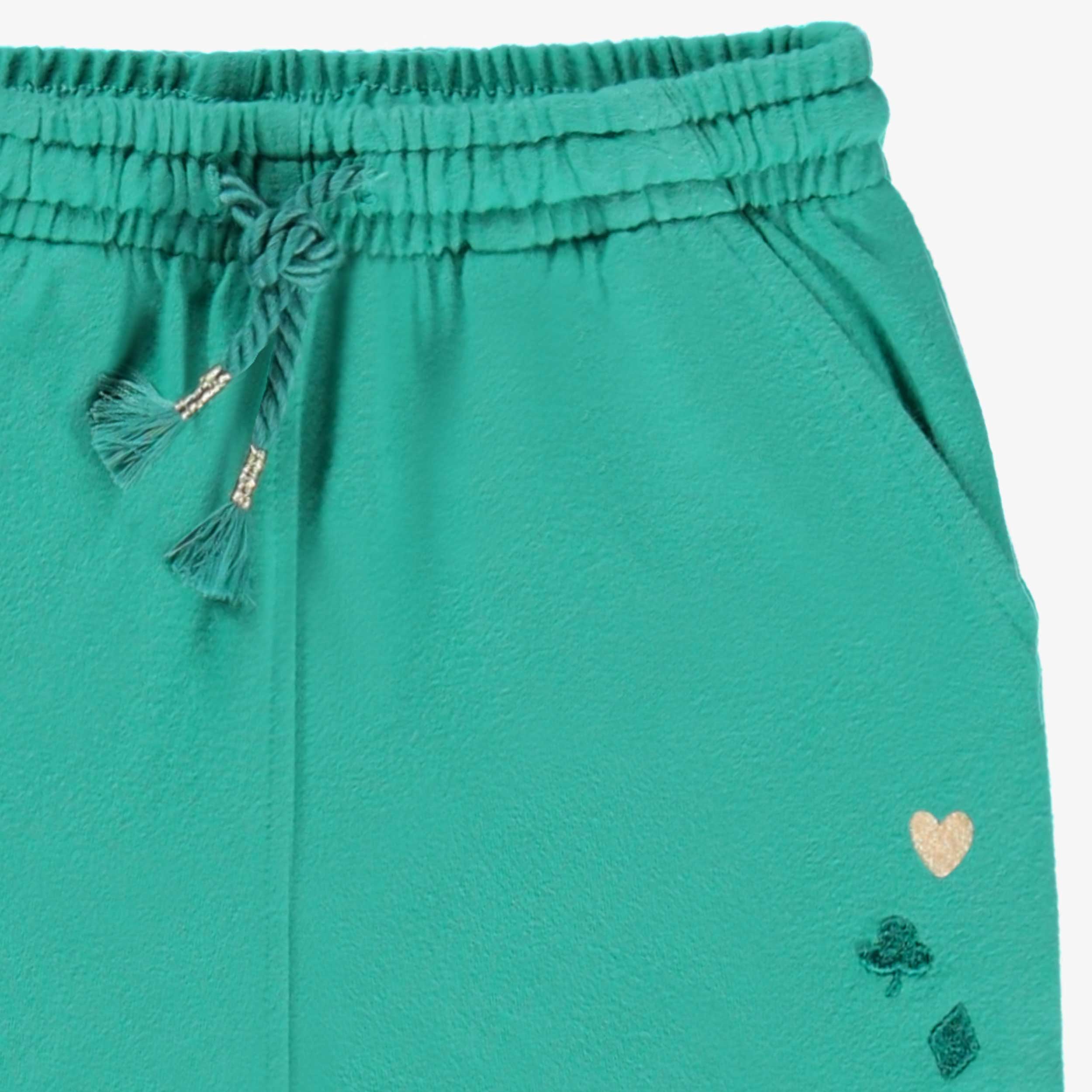 Zoom détails du pantalon turquoise style jogger, bébé