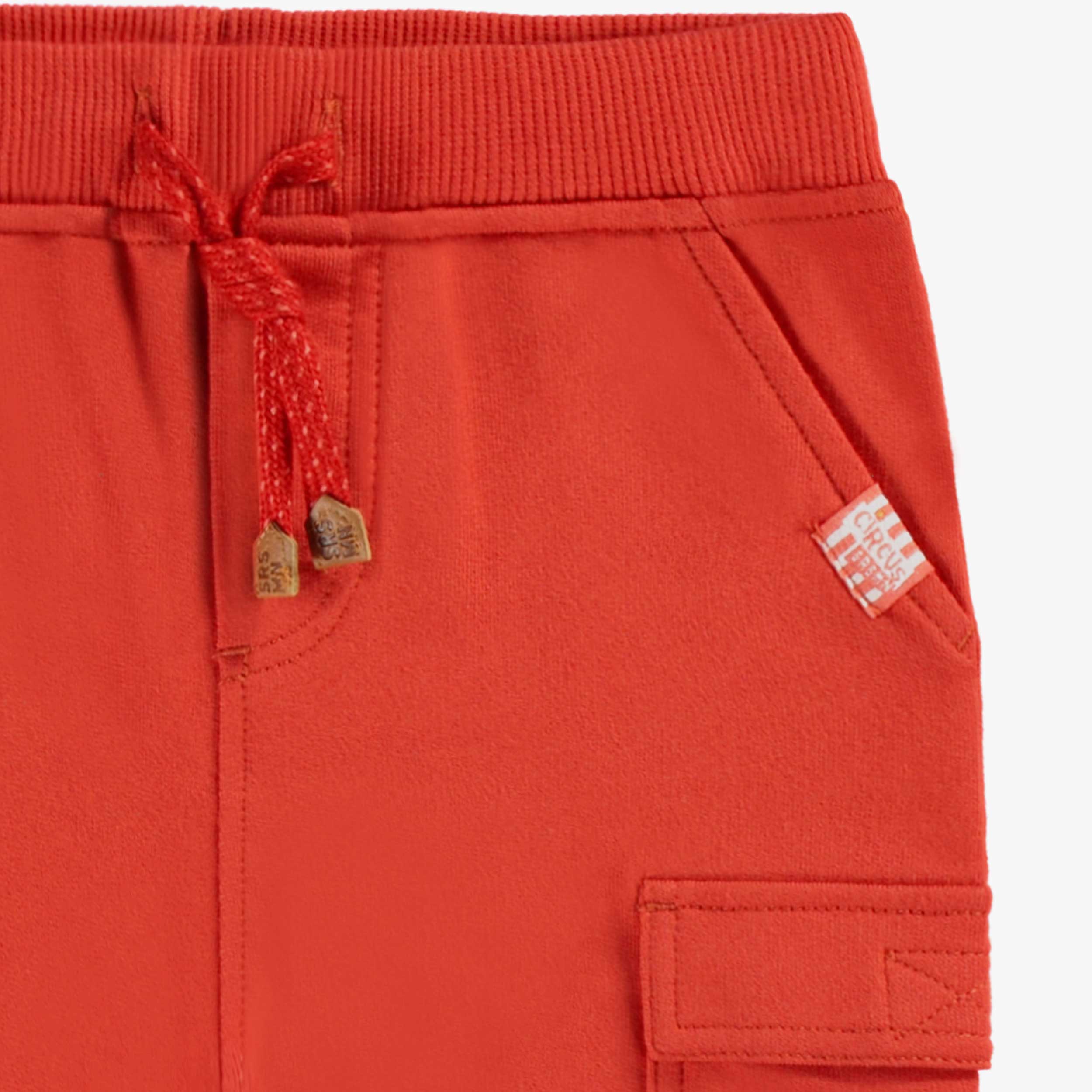 Red jogger pants, baby