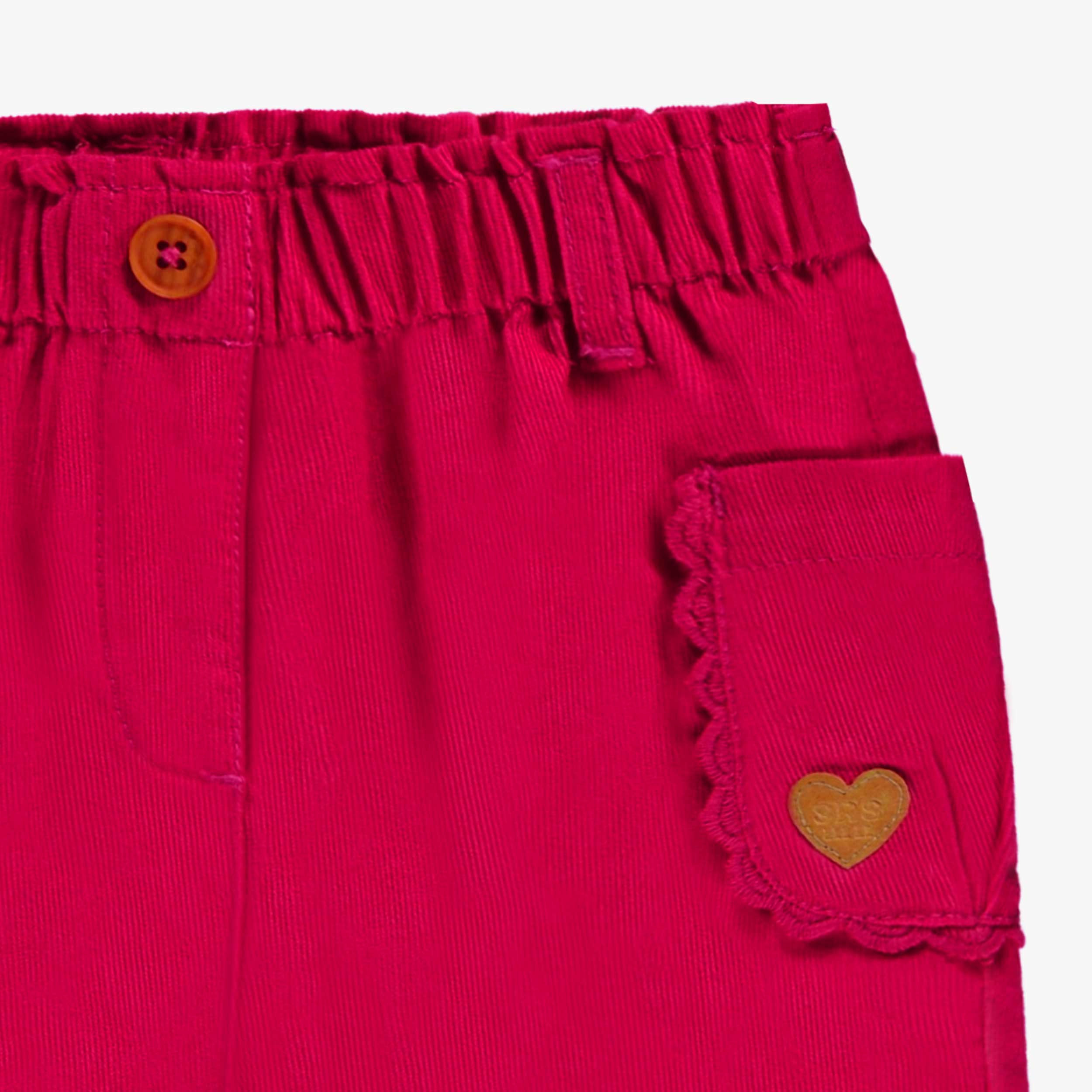 Zoom détails du pantalon rose en velours côtelé, bébé