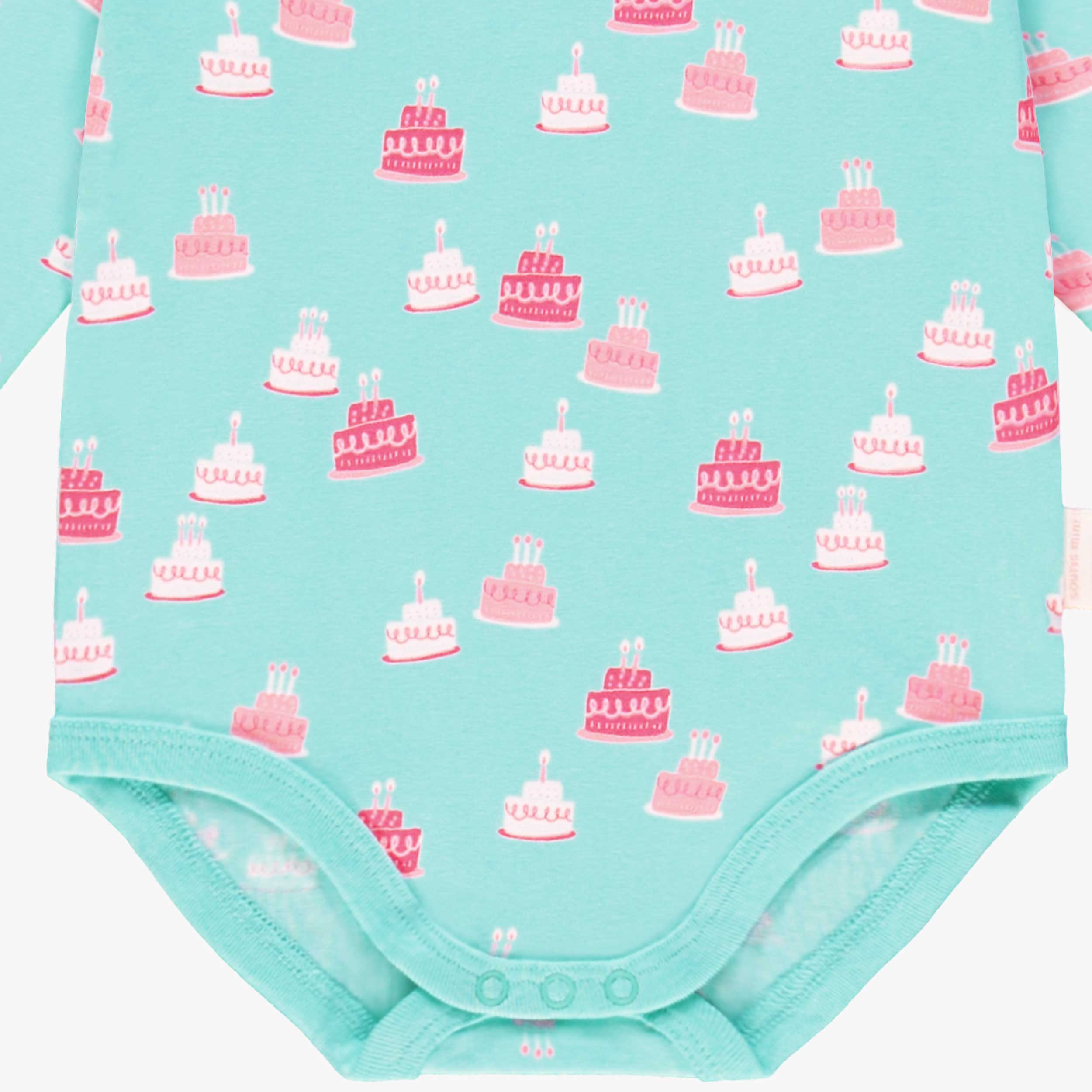 Zoom illustrations du cache-couche turquoise à motifs de gâteaux, bébé