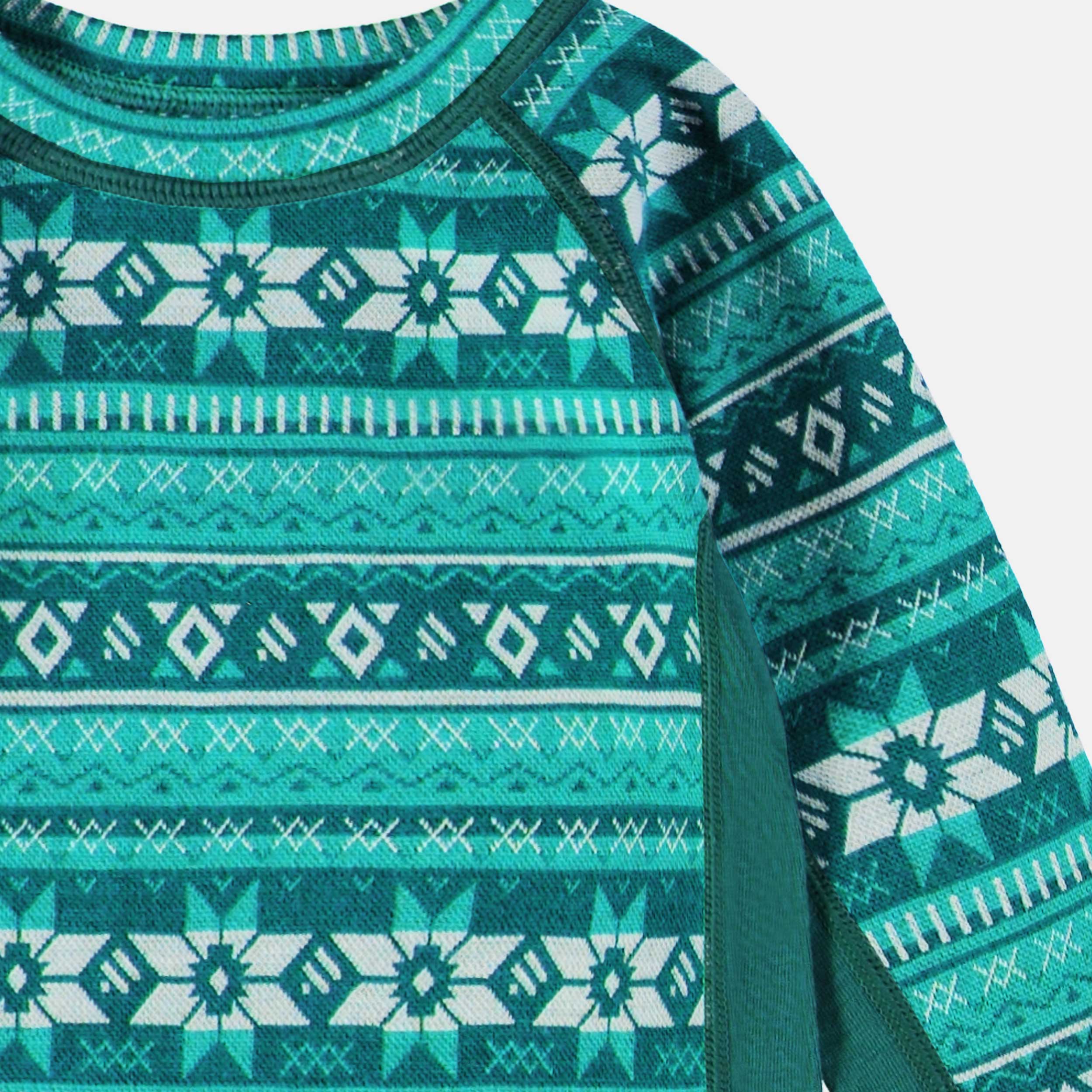 Zoom détails du chandail turquoise en laine mérinos avec motifs jacquard, bébé