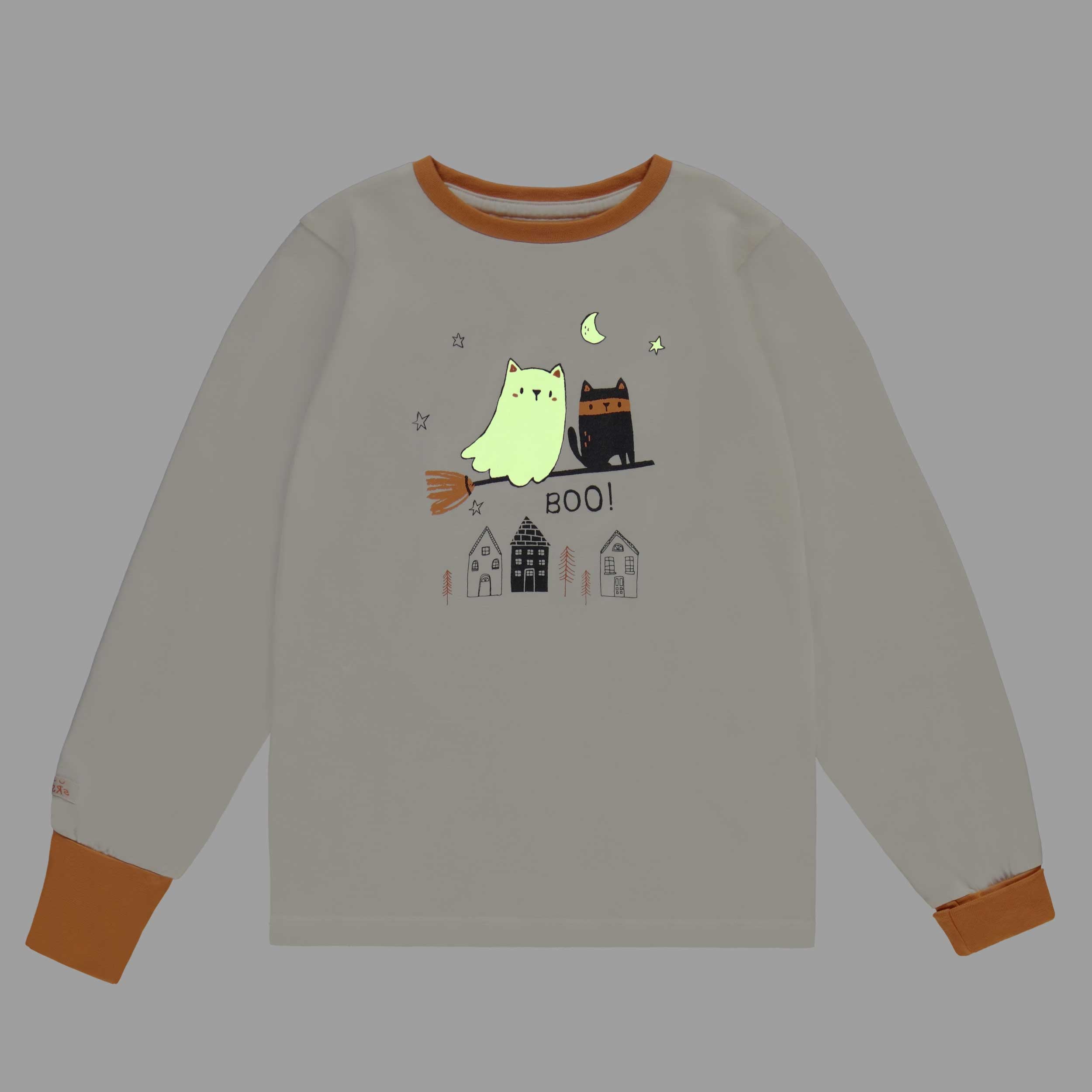 Haut du pyjama deux pièces crème et orange à motifs d’Halloween Brille dans le noir, enfant