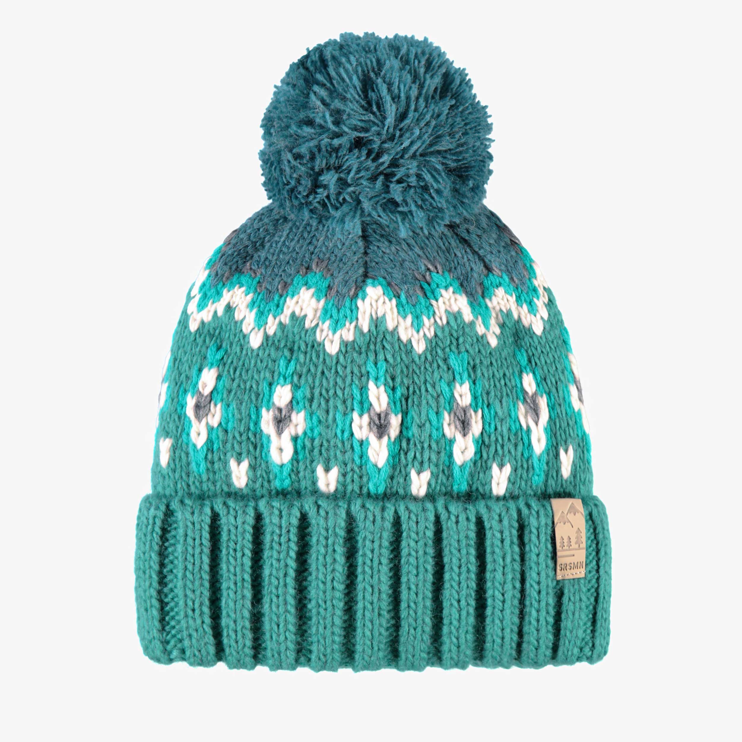 Turquoise knit hat with patterns, child