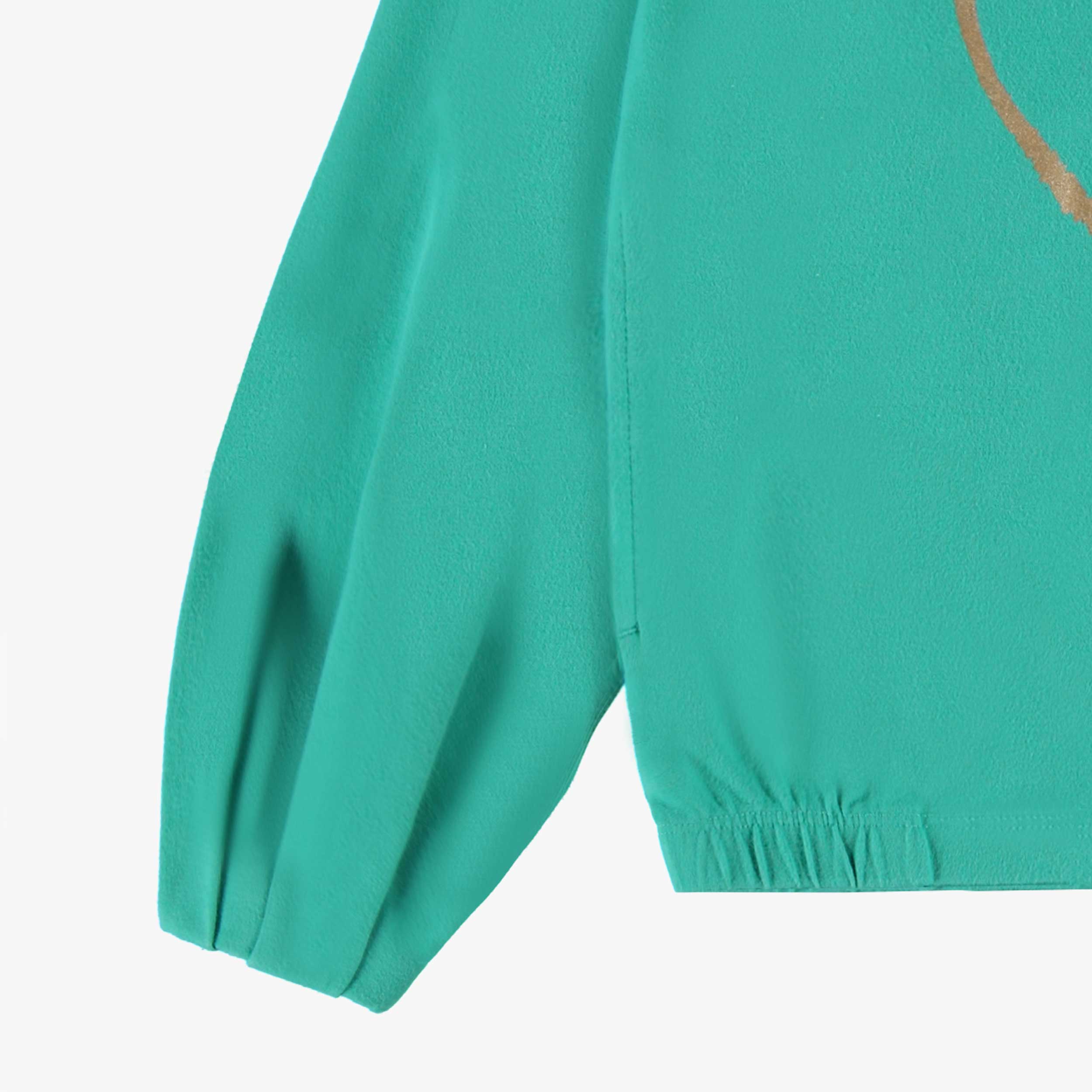 Détails manche de la veste à capuchon turquoise, enfant