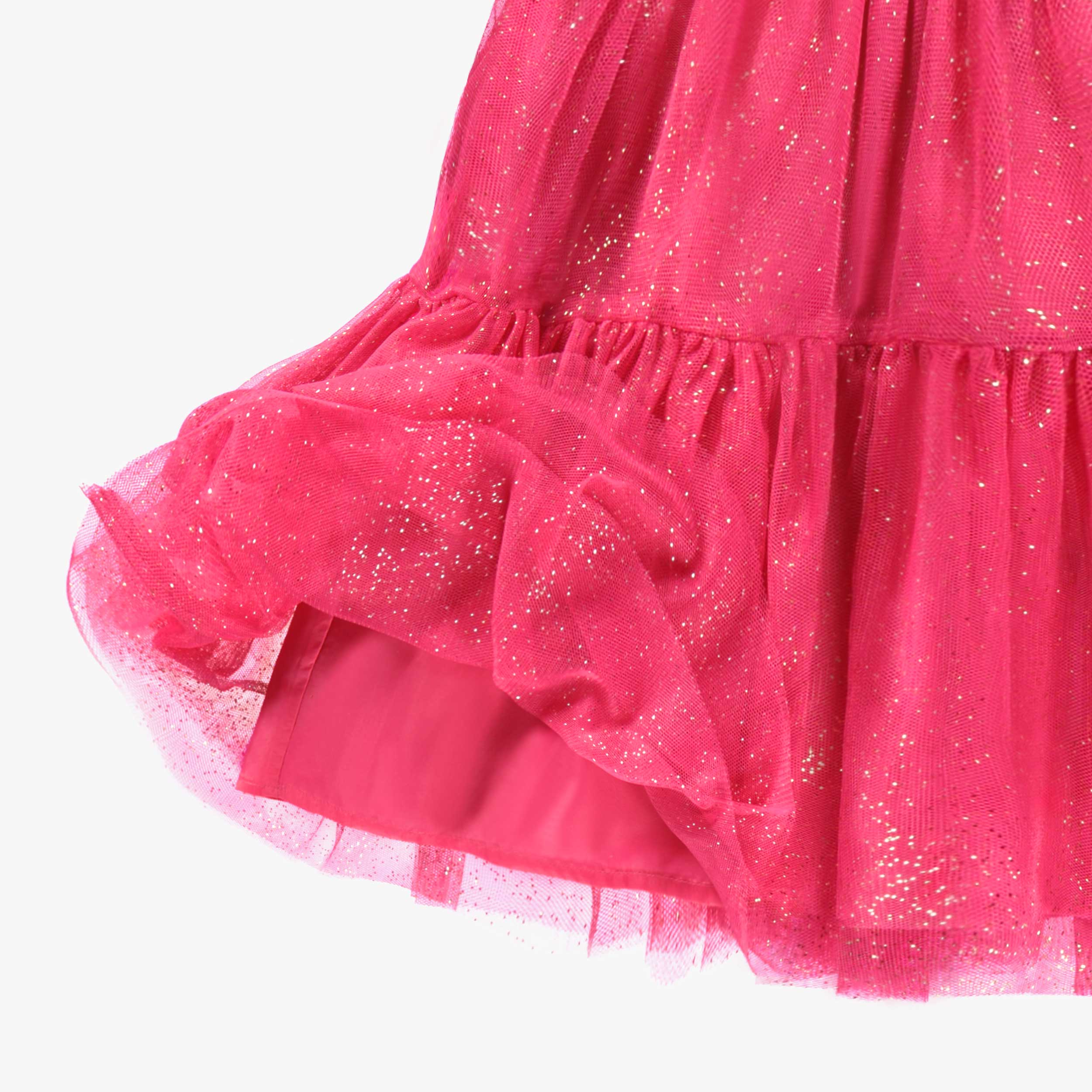 Zoom détails de la jupe tutu rose en tulle souple, enfant