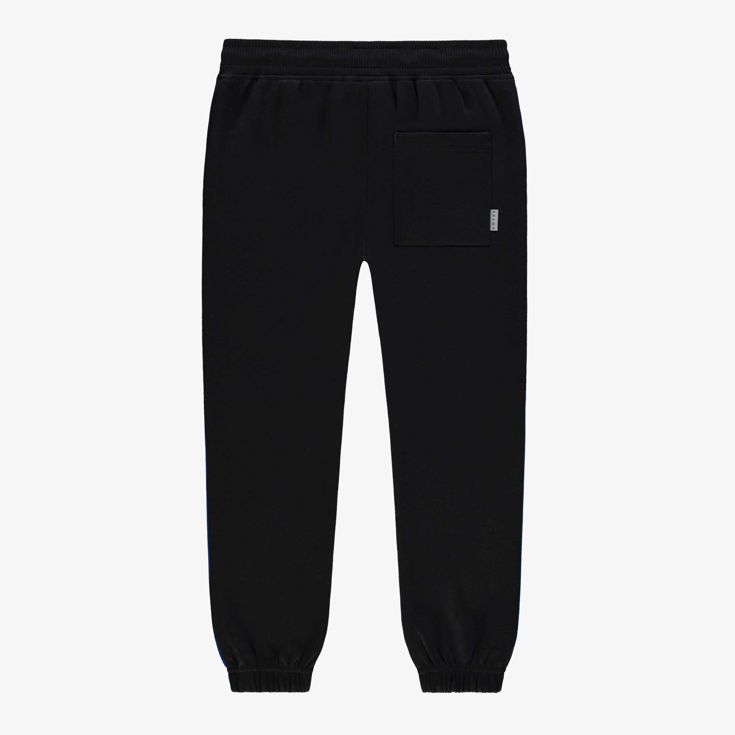 Dos du pantalon noir style jogger, enfant
