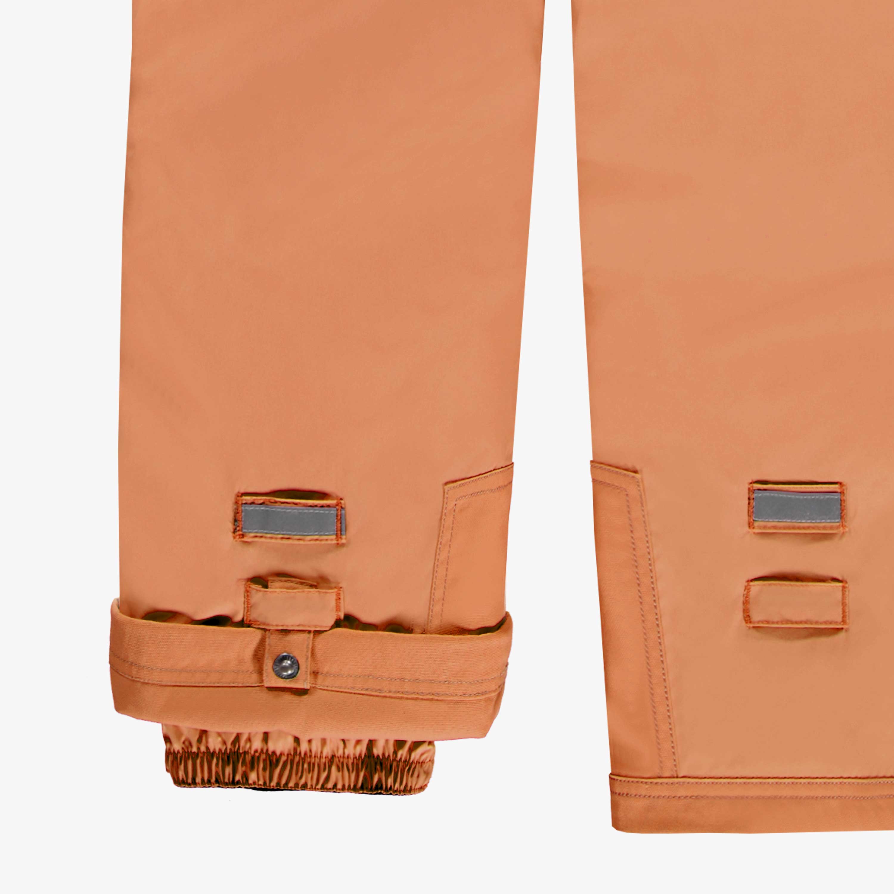 Green two-piece snowsuit with fir tree all over print, child