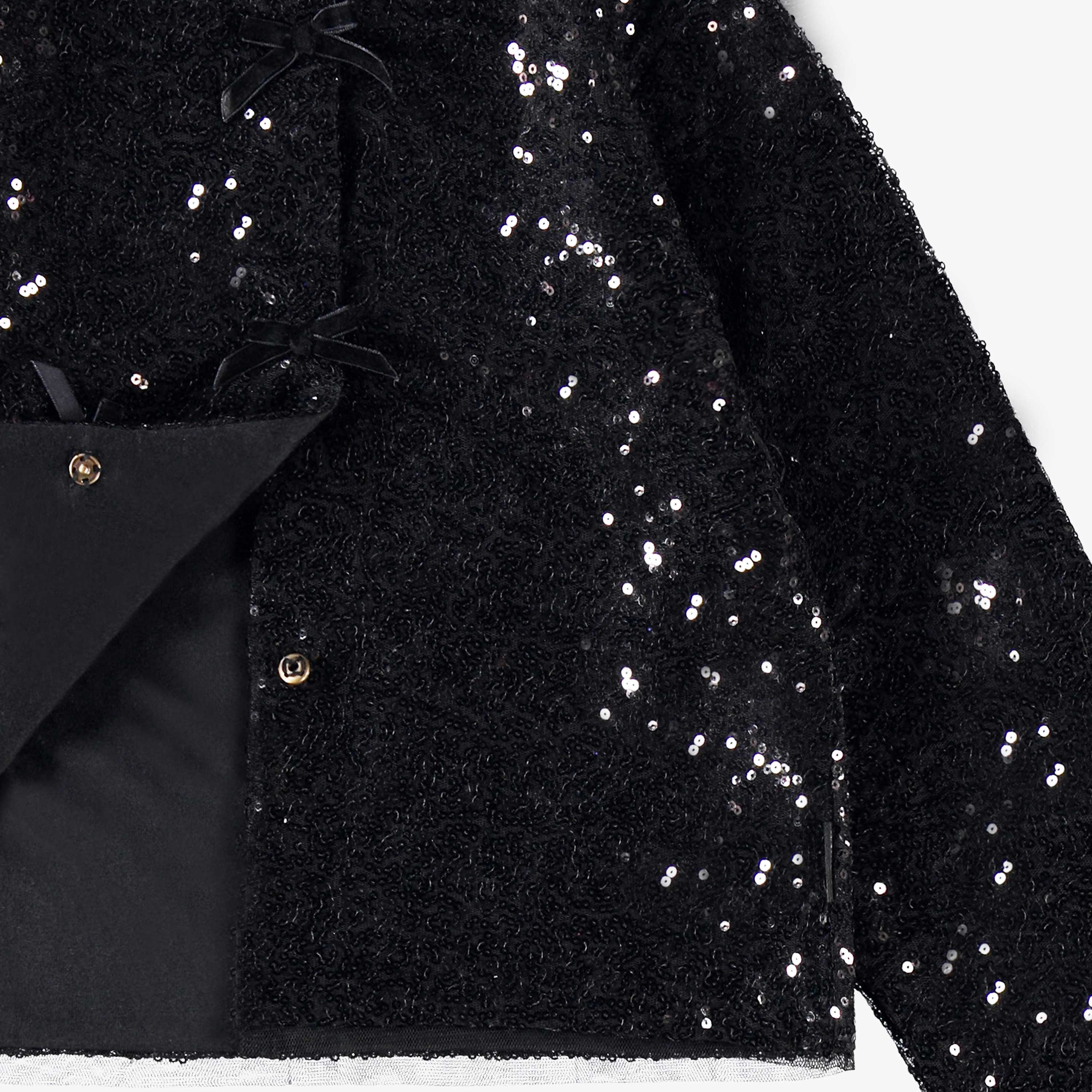 Zoom détails du veston noir à paillettes, enfant