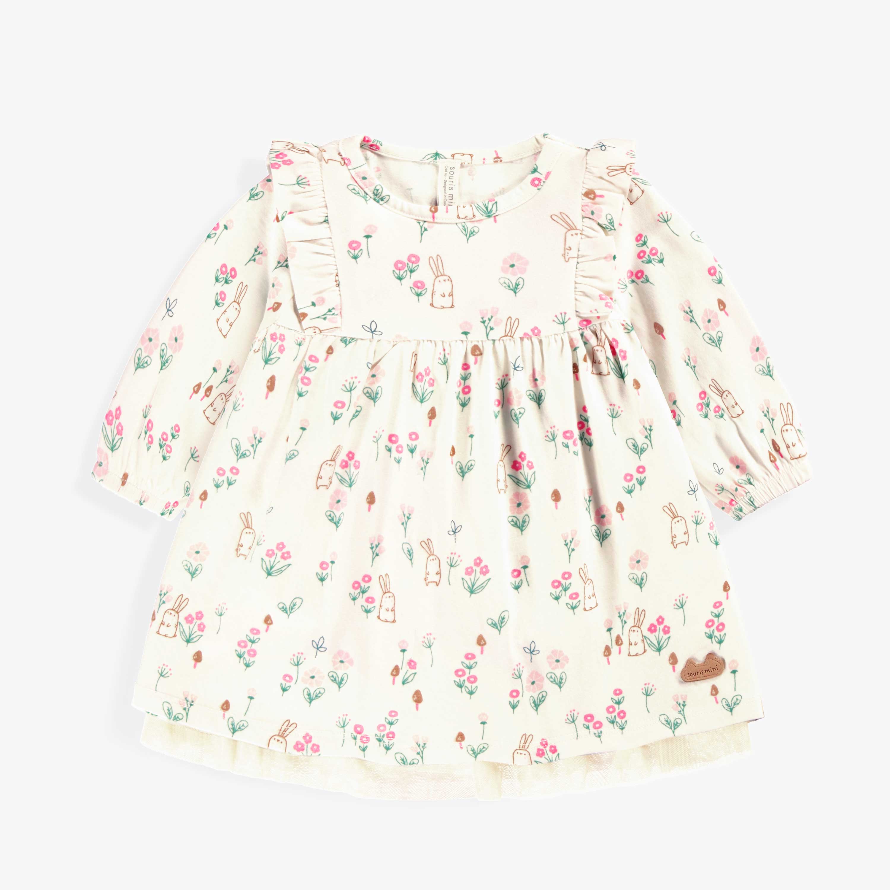 Robe crème à motifs, naissance