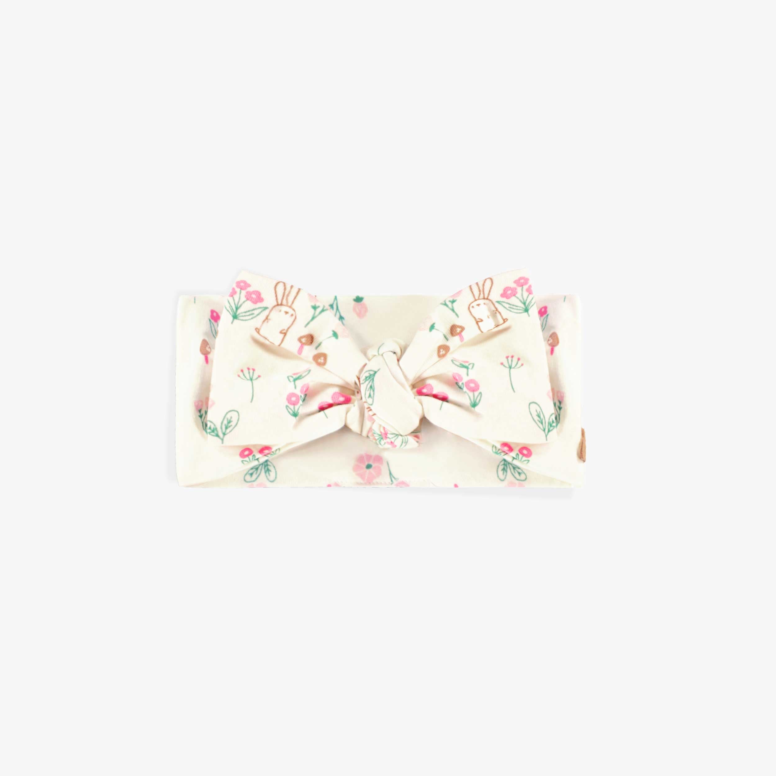 Bandeau crème à motifs, naissance