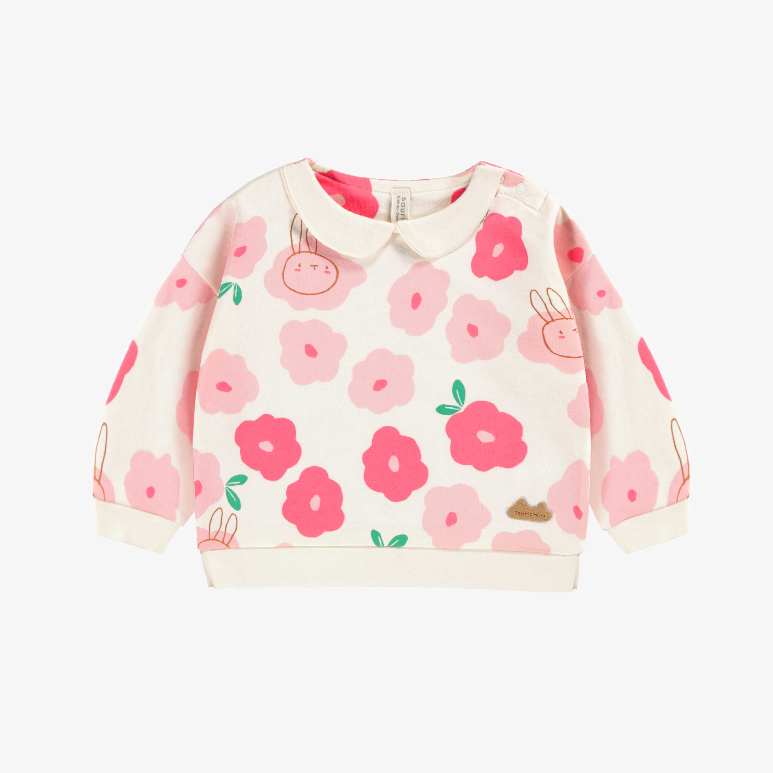 Chandail crème à motif floral, naissance