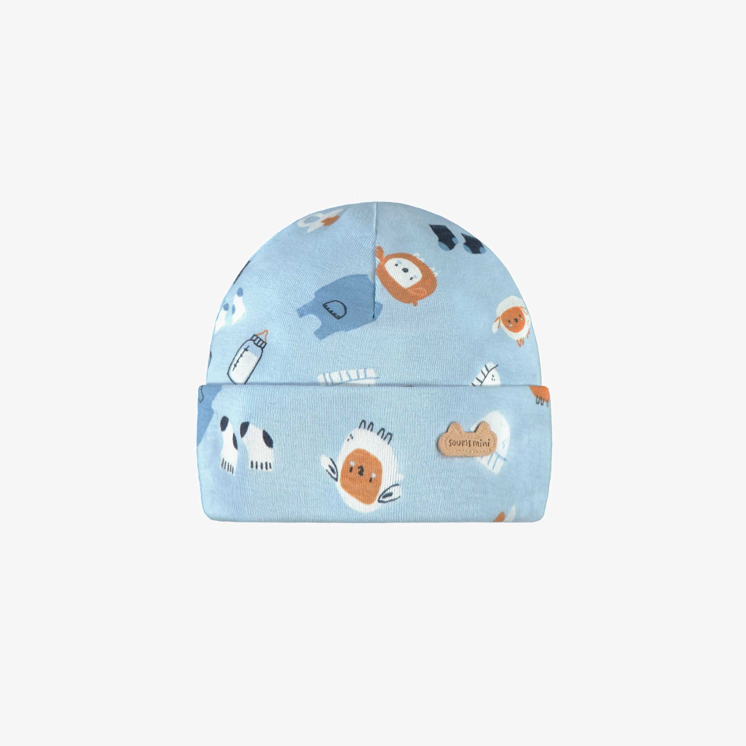 Bonnet bleu à motifs, naissance