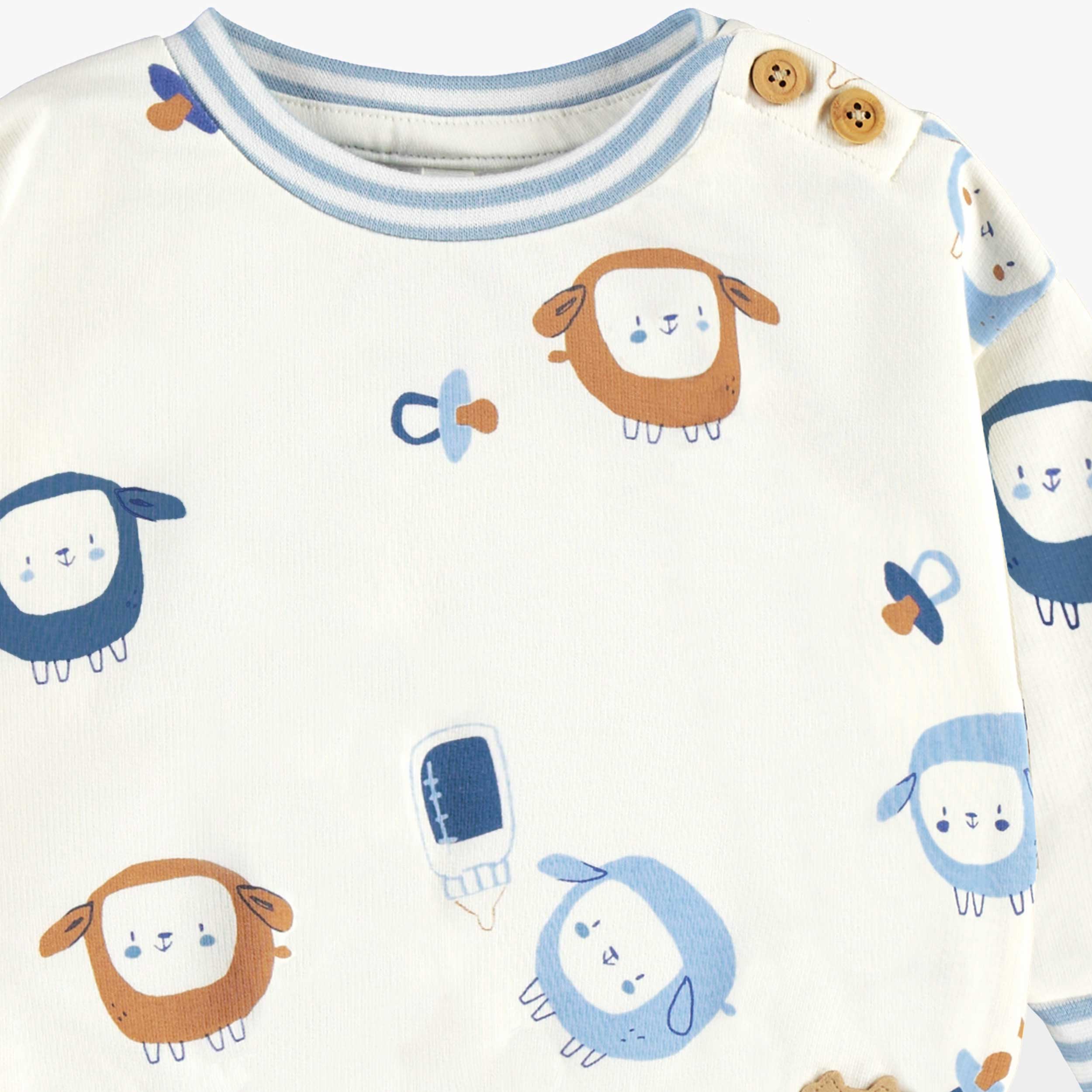 Zoom imprimés du chandail crème à motifs, naissance