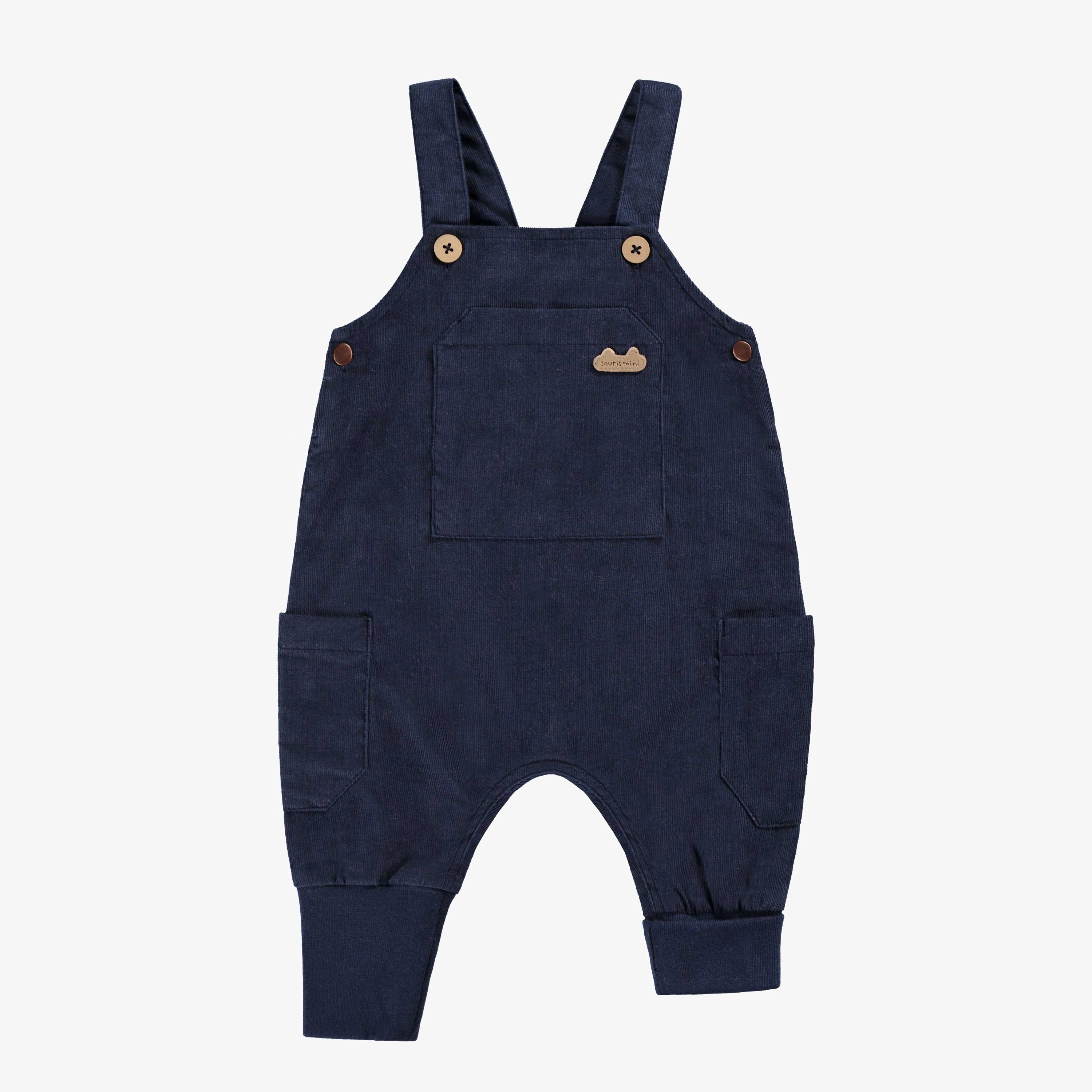 Salopette bleu marine, naissance