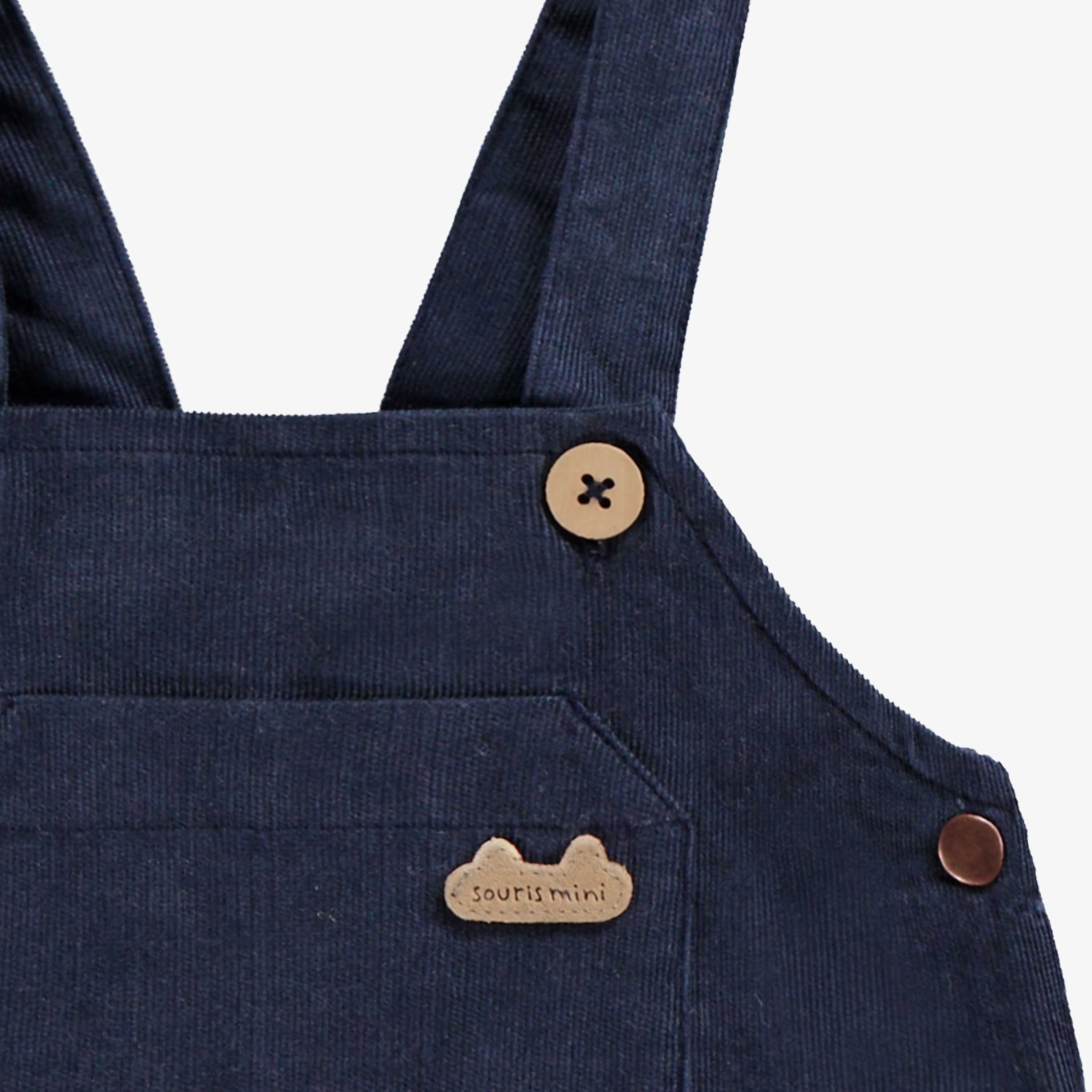 Zoom détails de la salopette bleu marine, naissance