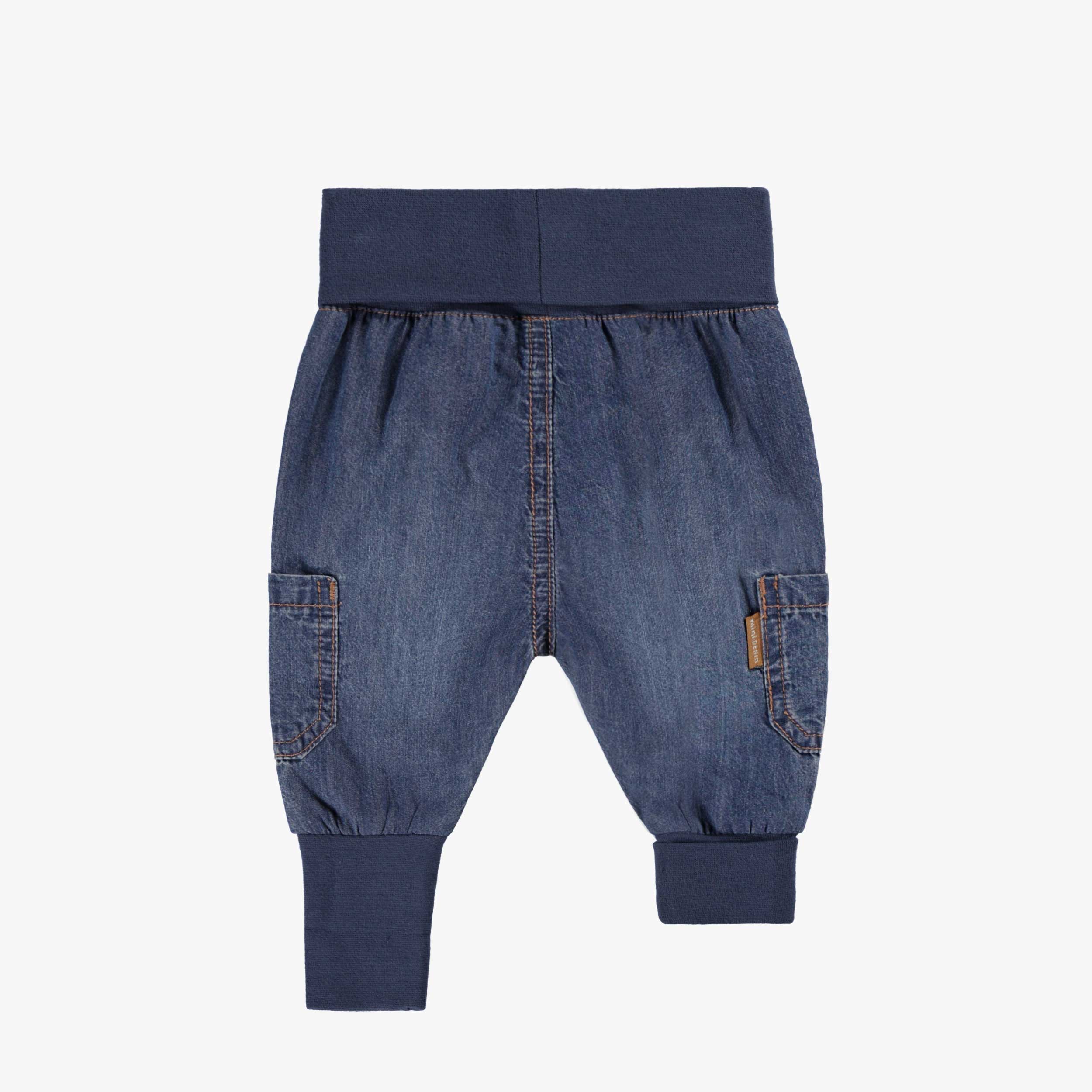 Dos du pantalon évolutif en denim, naissance