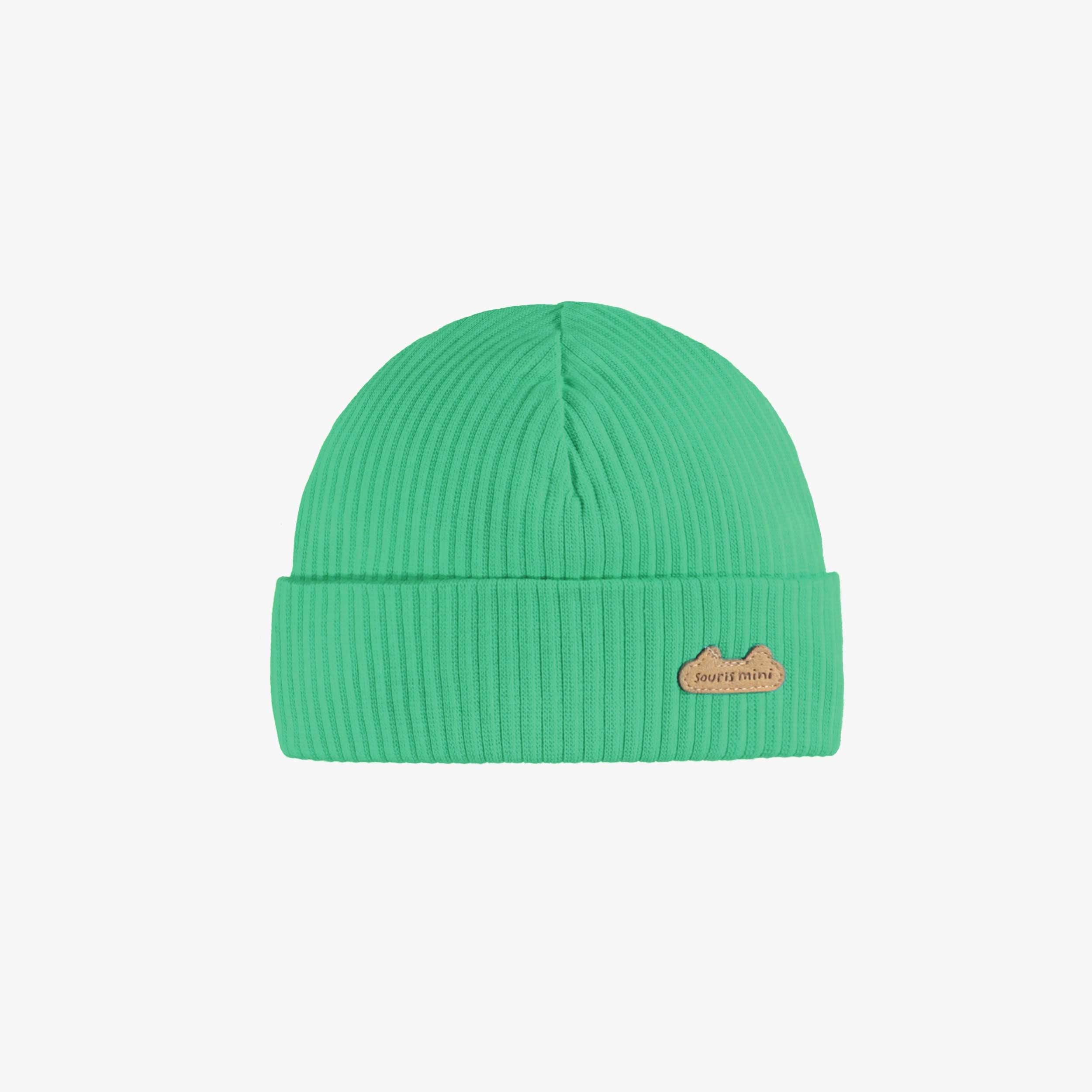 Bonnet vert en tricot côtelé, naissance