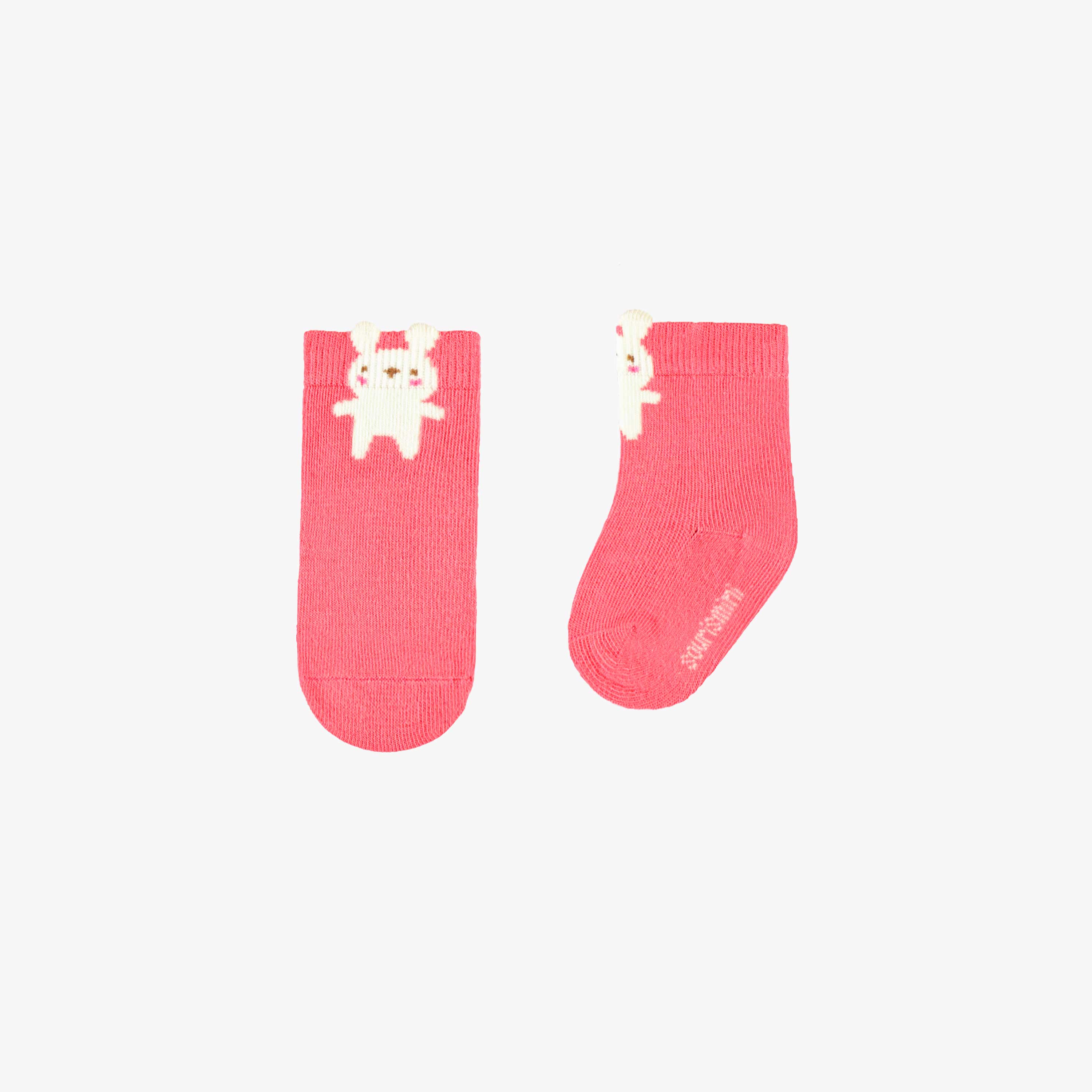 Chaussettes roses avec lapin, naissance