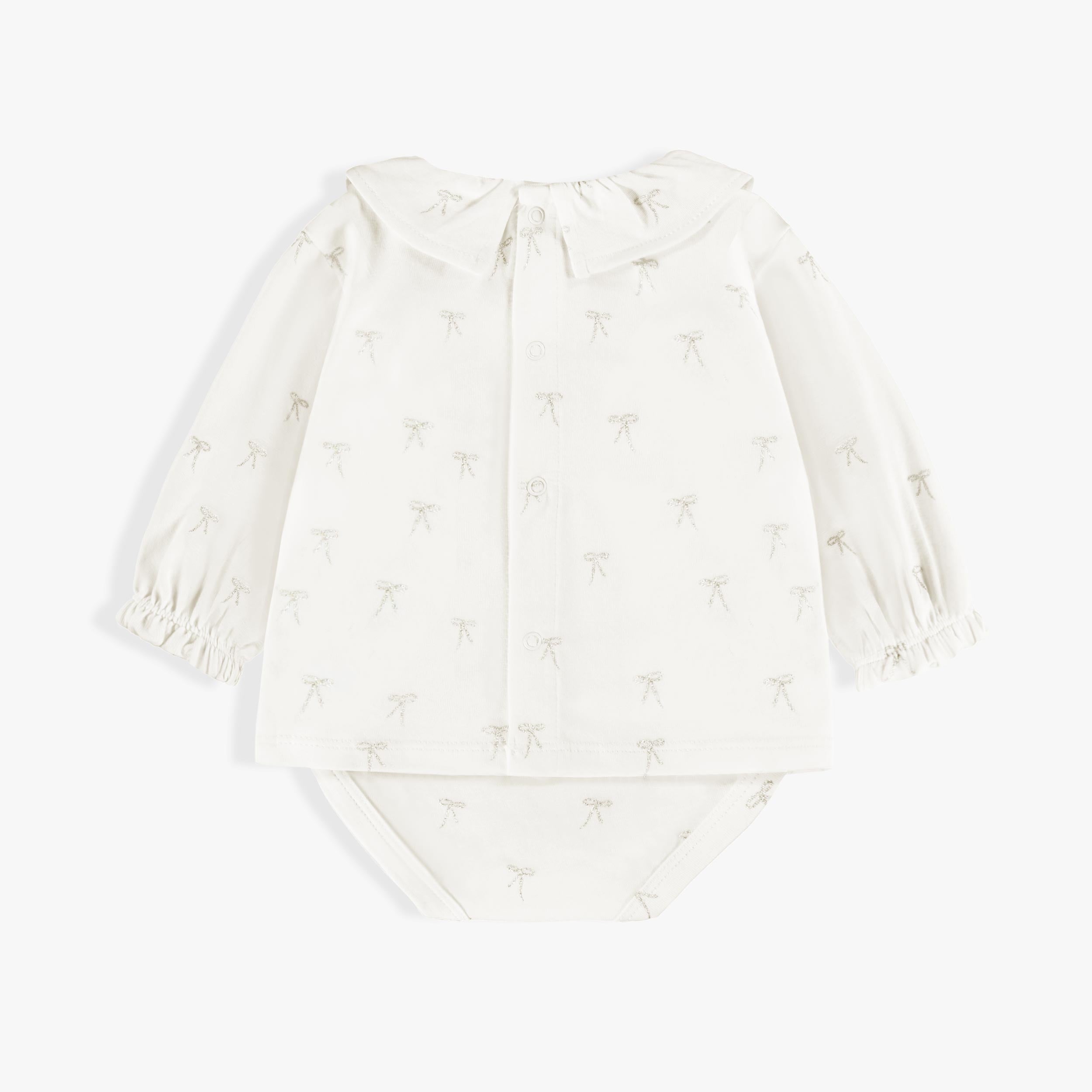 Dos de la chemise cache-couche crème, naissance