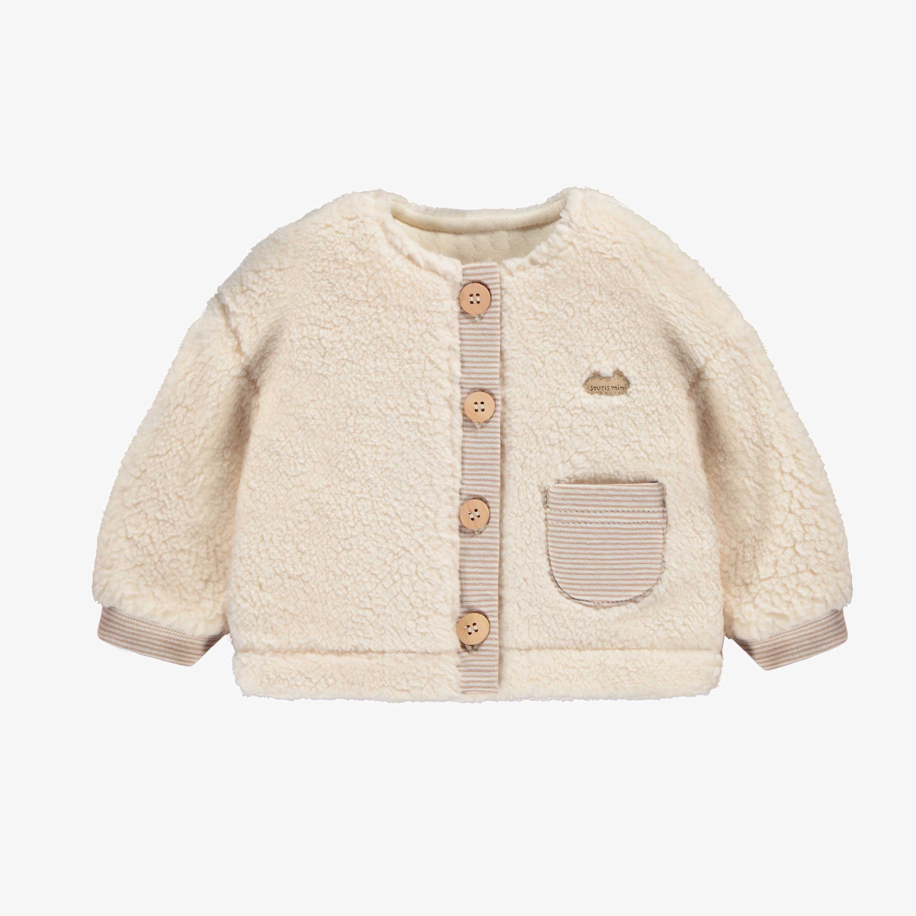 Veste crème en sherpa, naissance