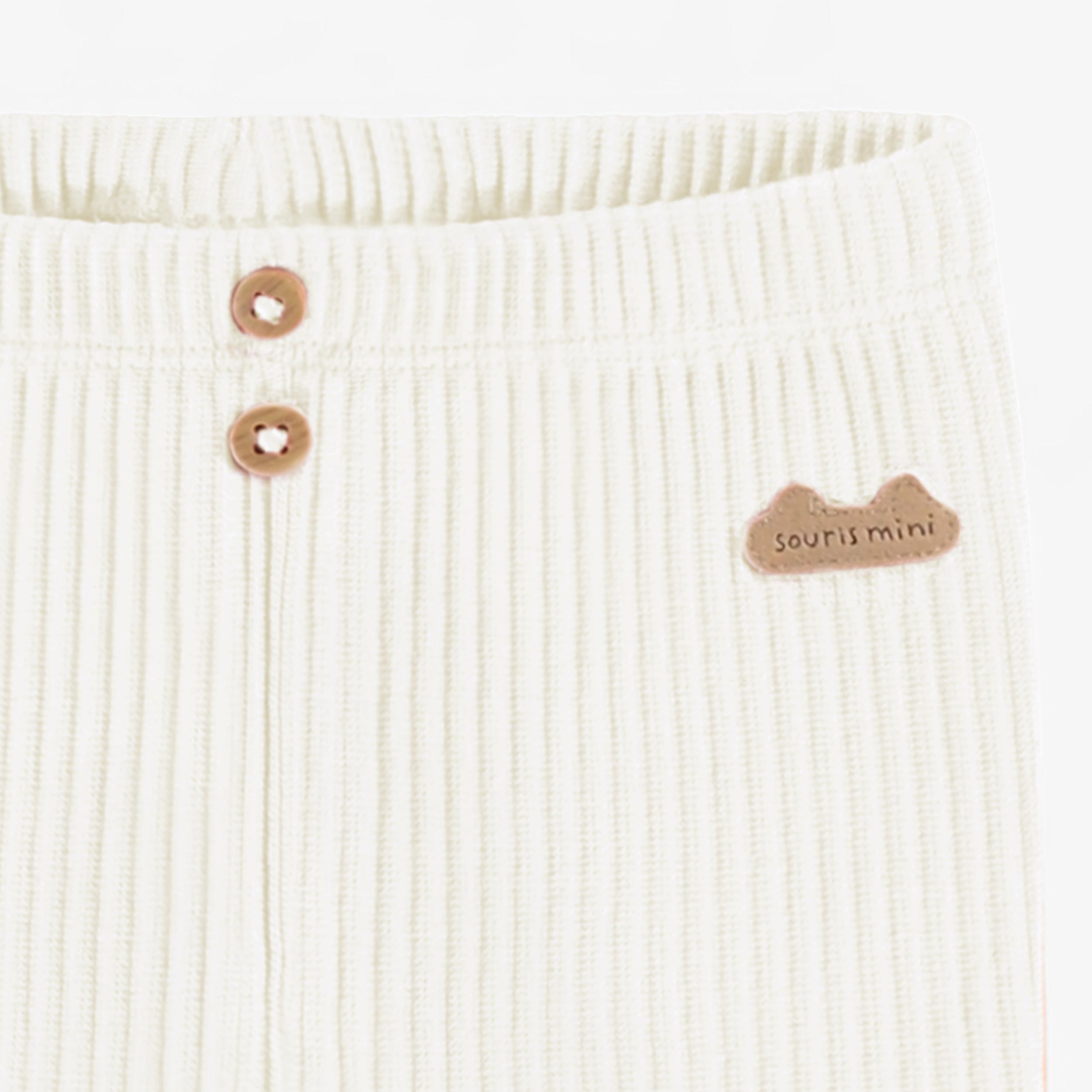 Zoom détails du legging crème en tricot côtelé longueur 3/4, naissance