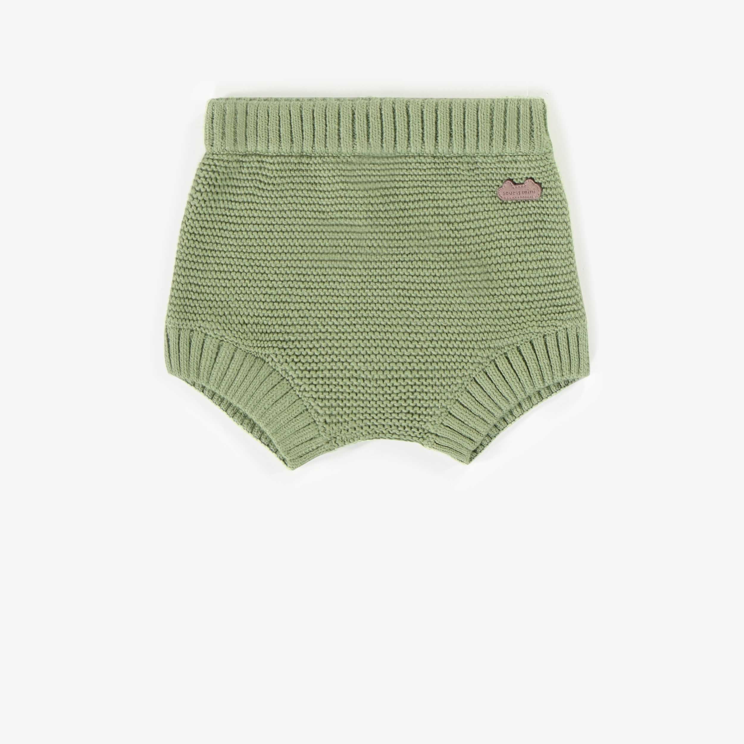 Short vert en maille, naissance