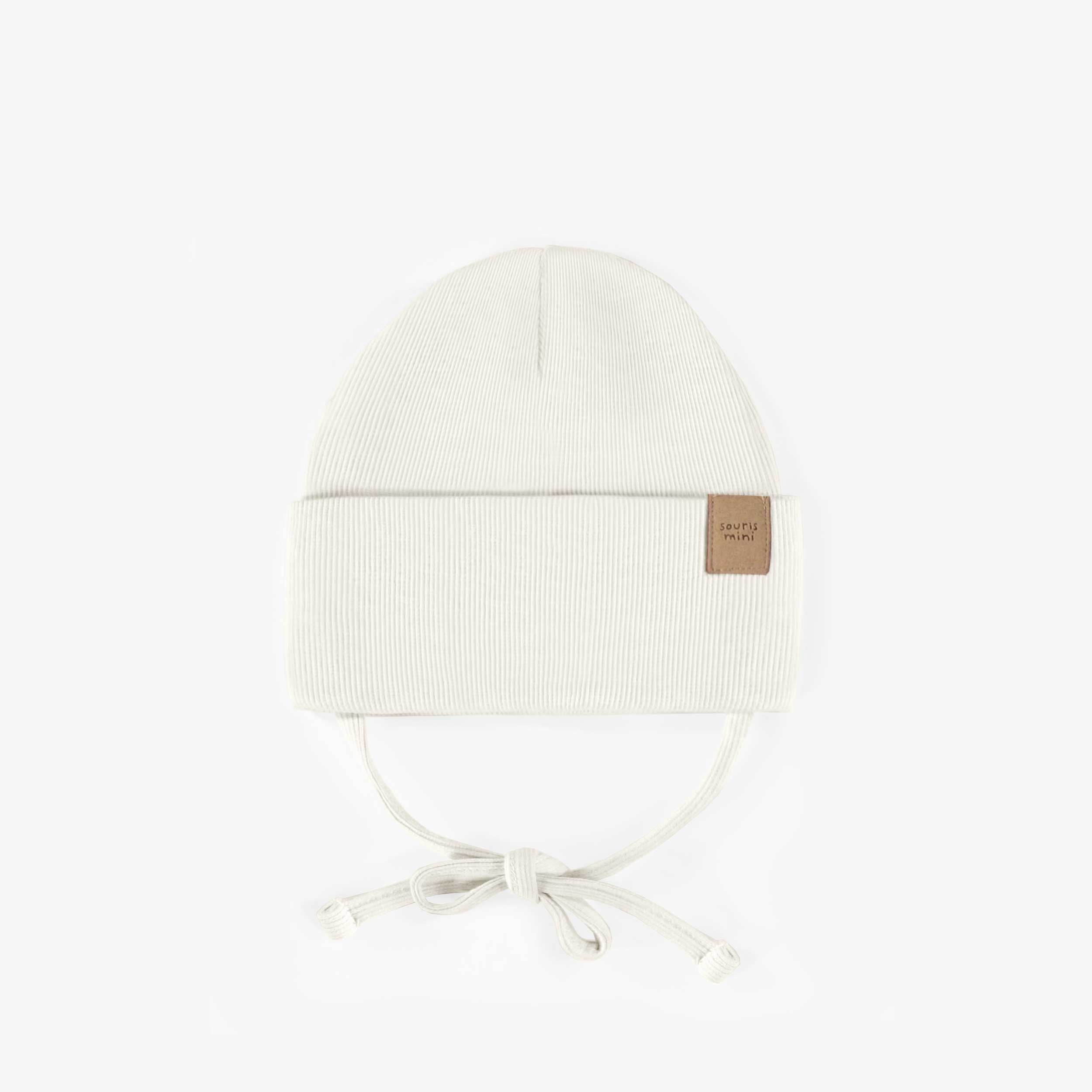 Chapeau crème d’extérieur avec cordons en tricot côtelé, naissance