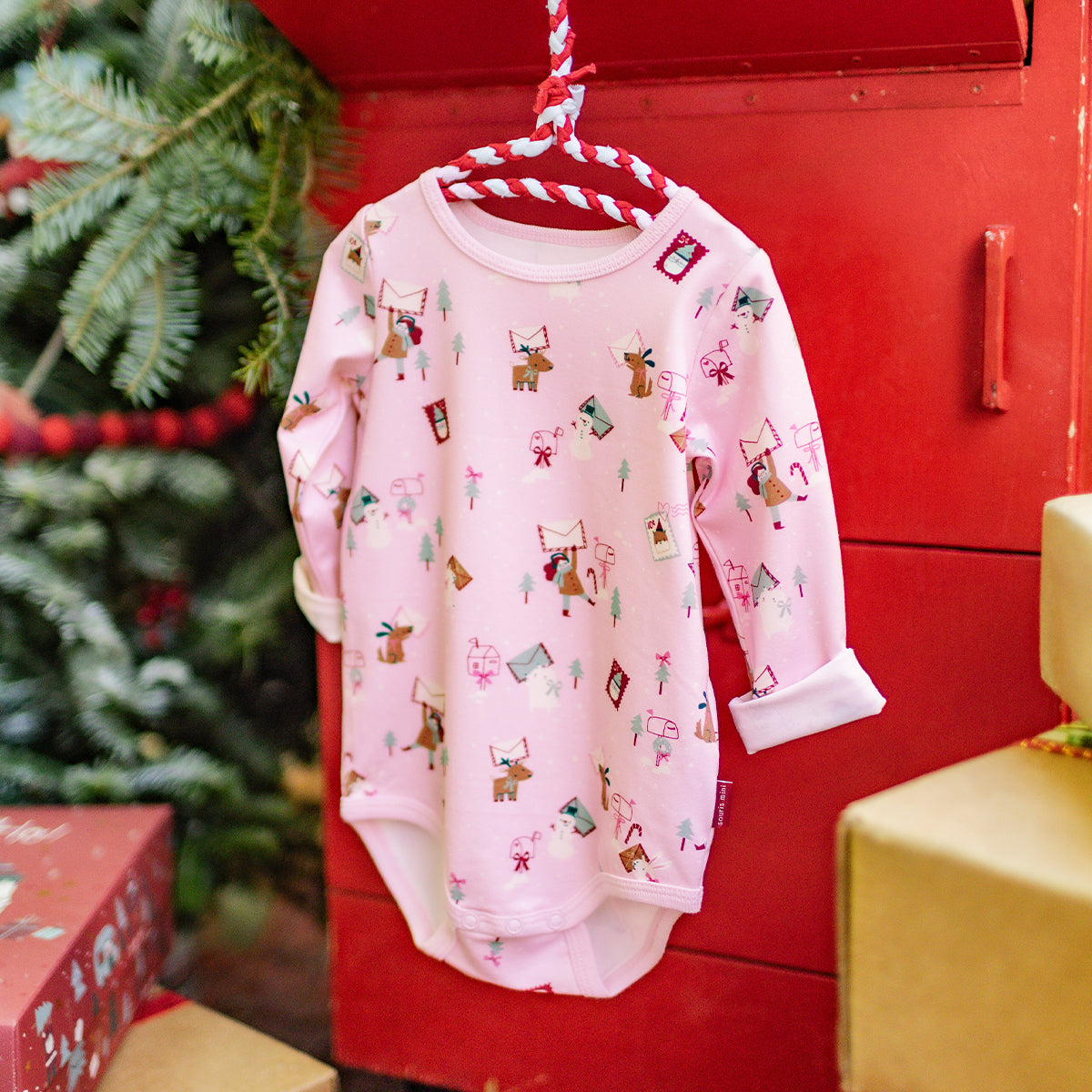 Pink bodysuit with holiday all over print, baby