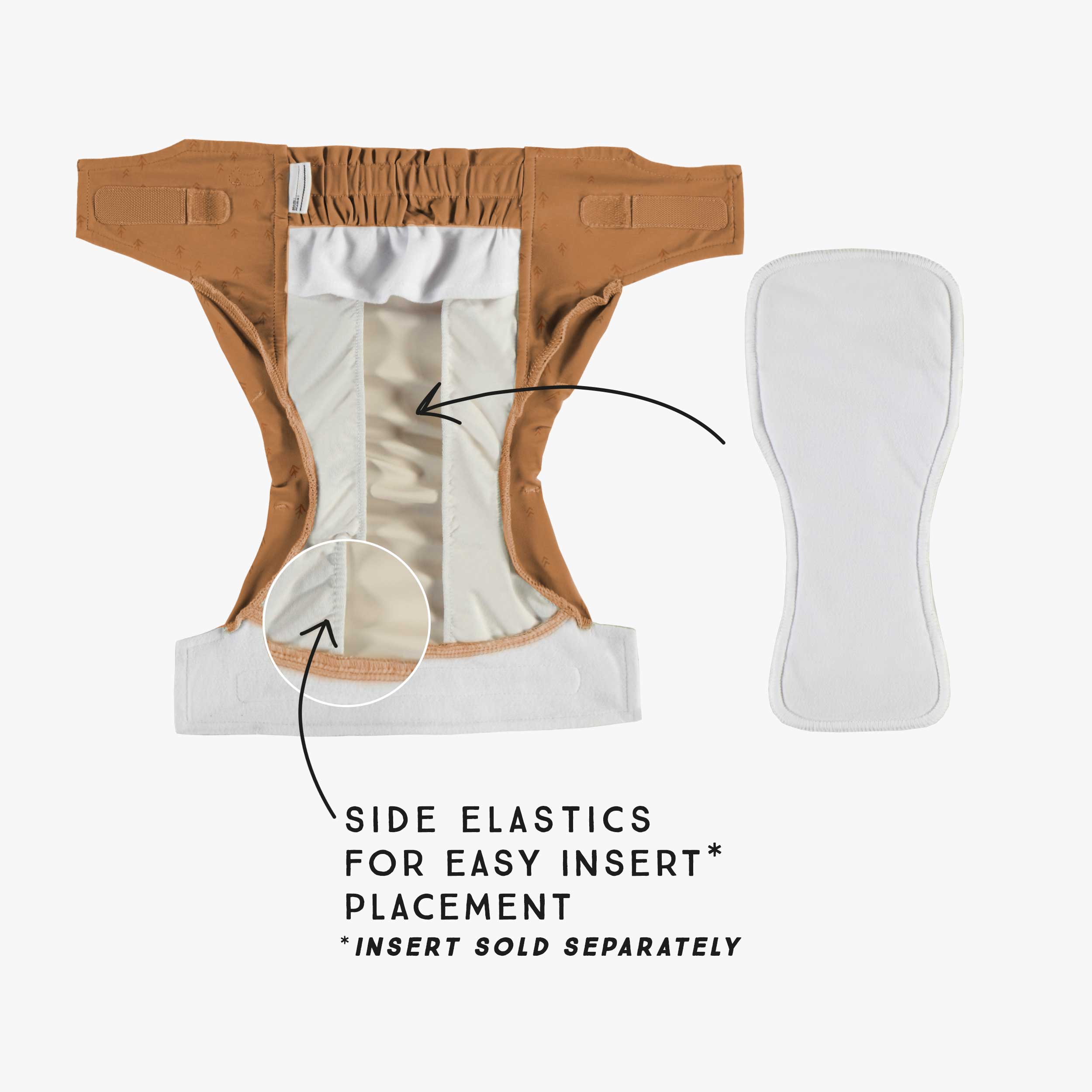 Détail de la couche réutilisable ultramince caramel à motif de flèches, bébé