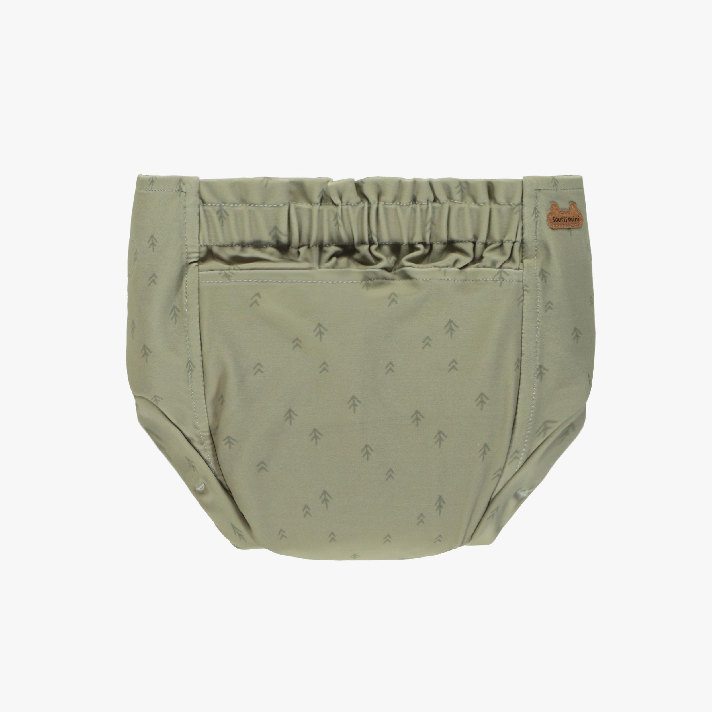 Sage green reusable diaper with arrow pattern, baby