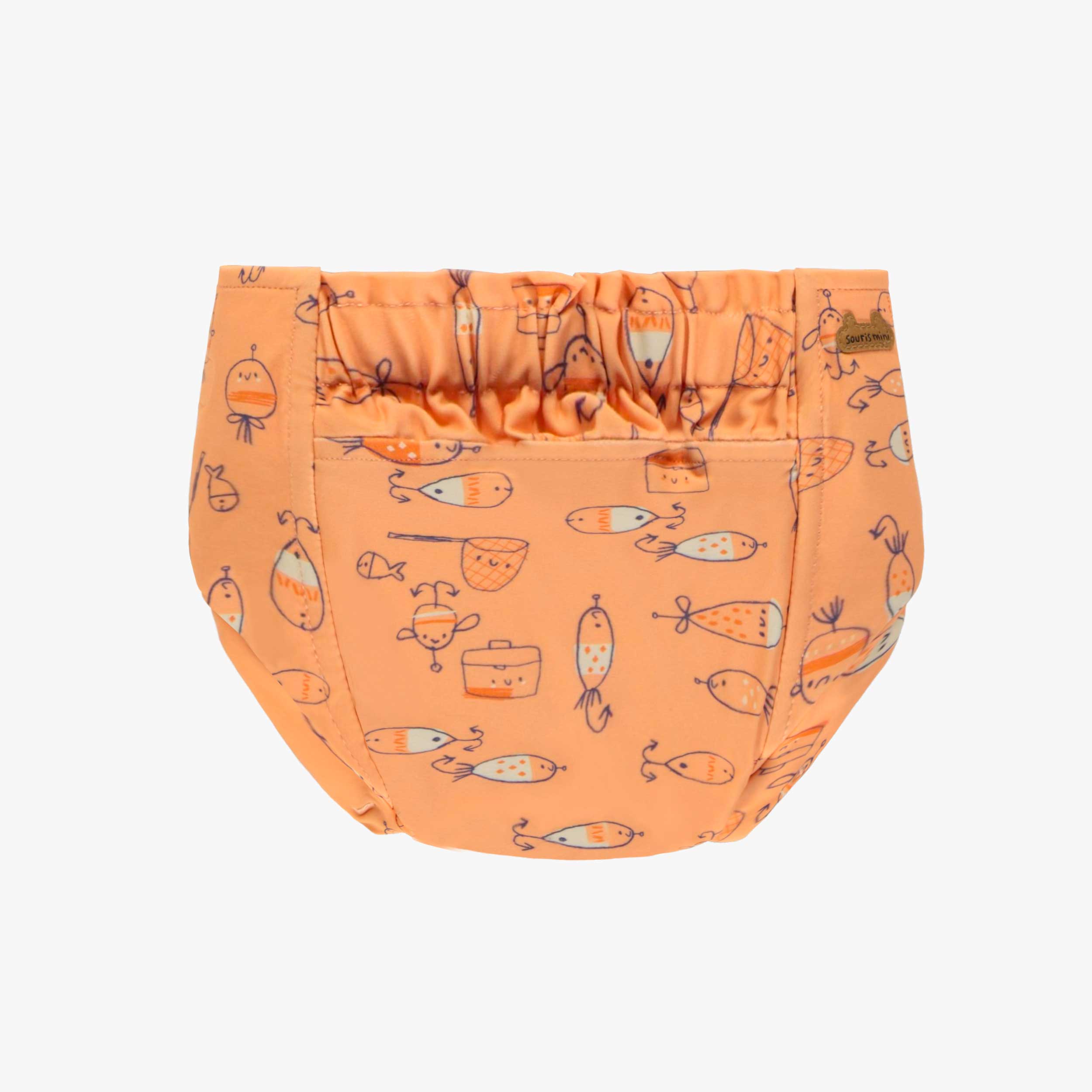 Dos de la couche réutilisable ultramince orange à motif de poissons, bébé