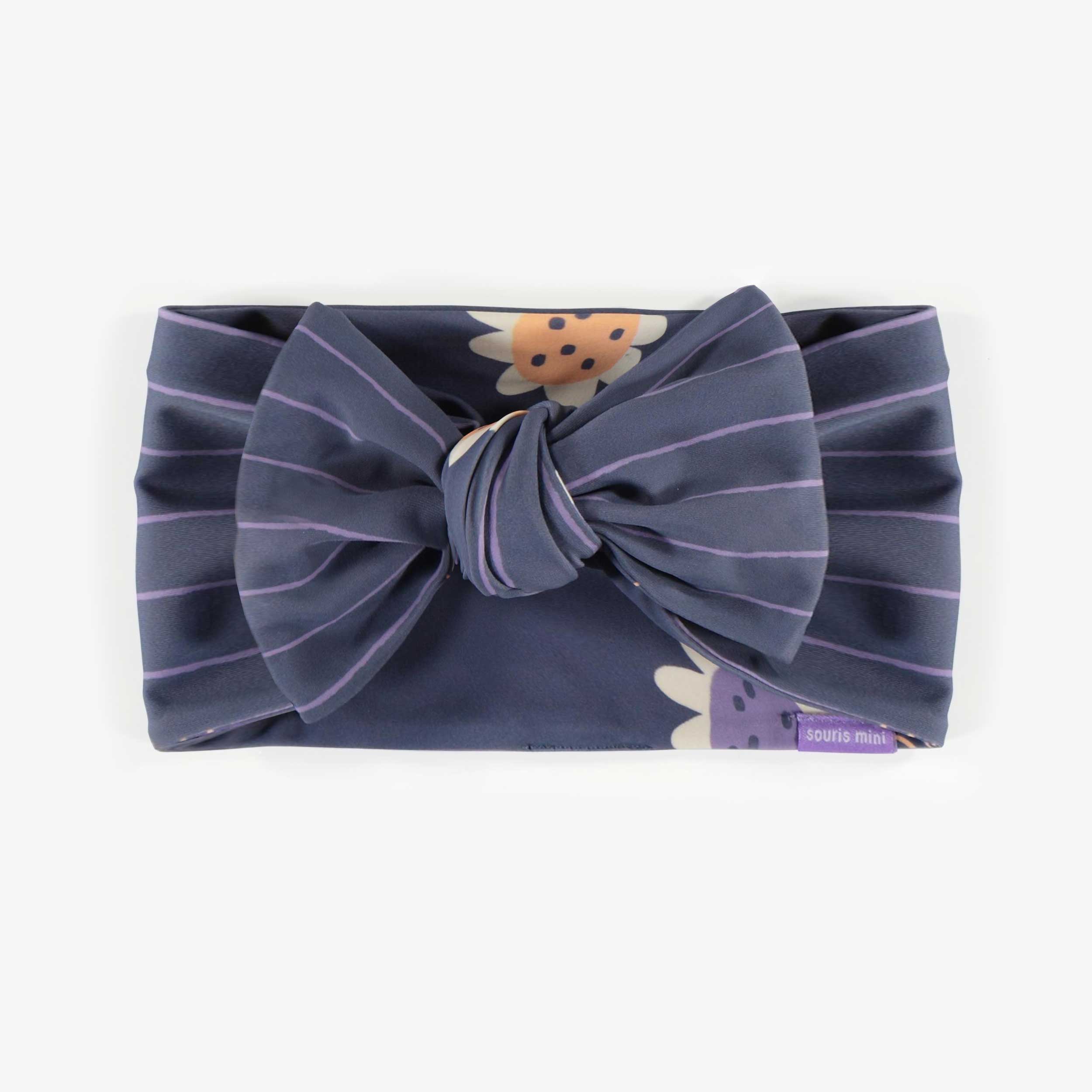 Reversible blue headband with lined or flowered pattern, child