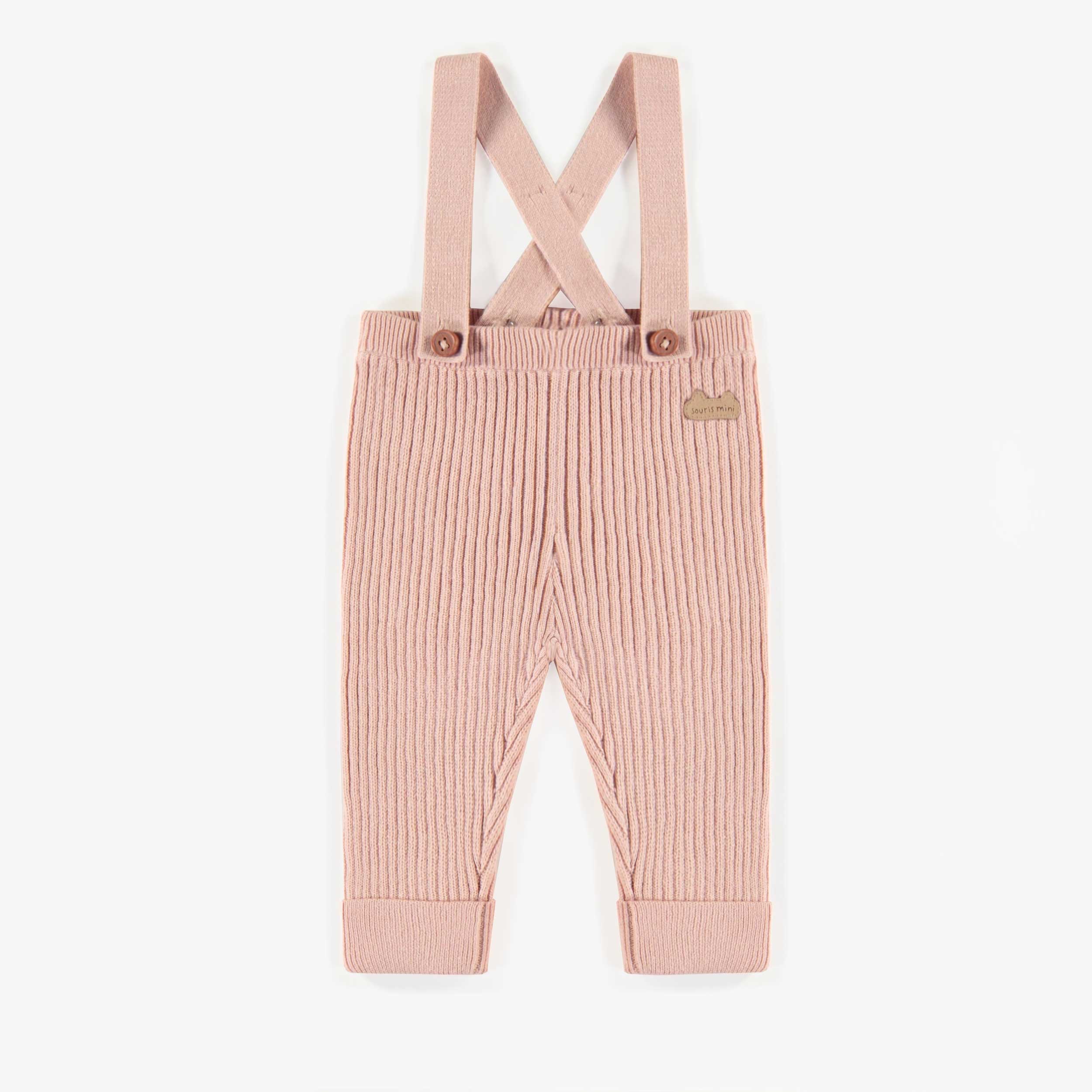 Pantalon de maille rose pâle avec bretelles, naissance